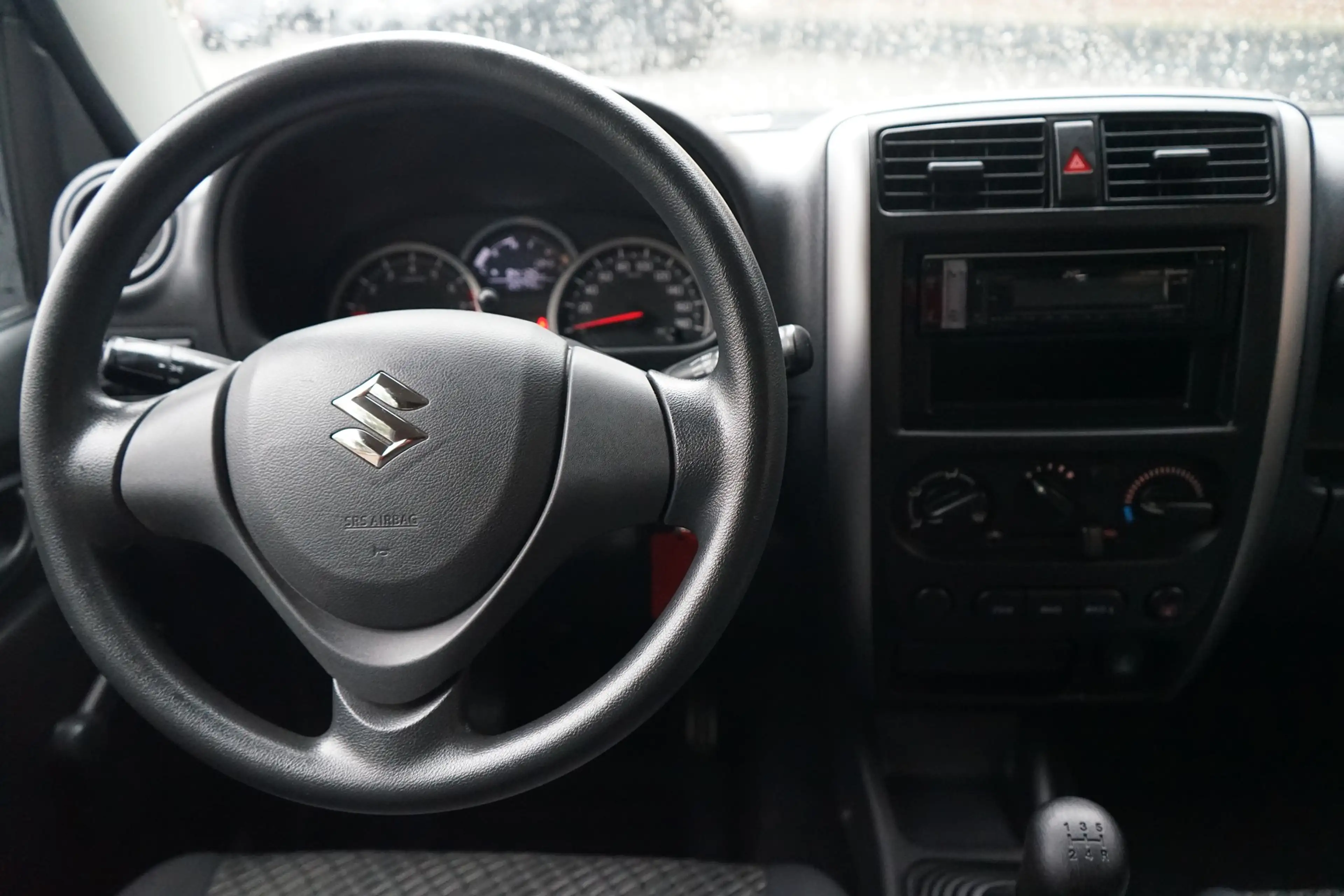 Suzuki Jimny 1.3 Club 4x4 AHK Bluetooth — photo 12