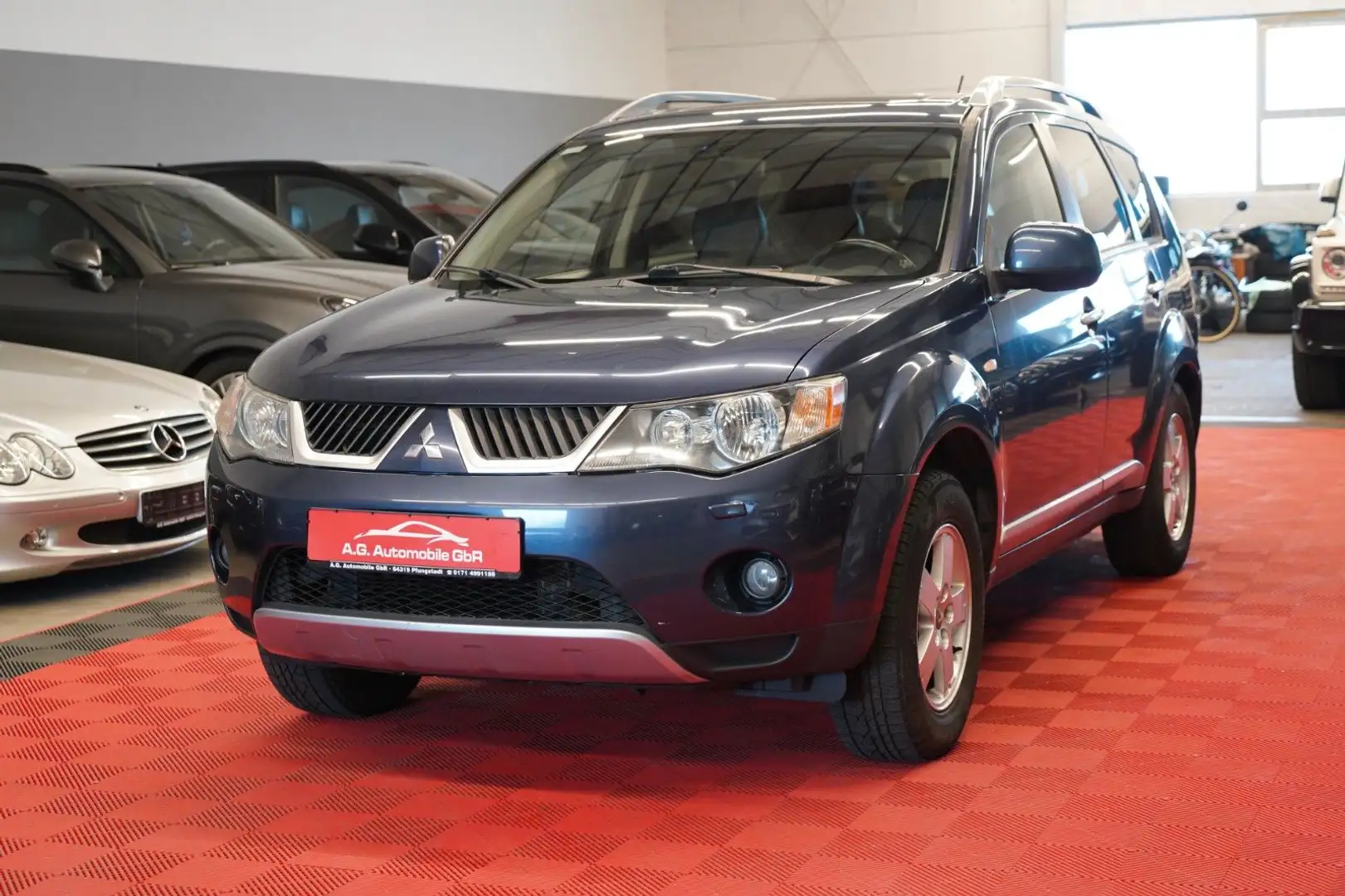 Mitsubishi Outlander 2.2 DI-D Instyle 4WD *7Sitzer*Navi*AHK Bleu - 1