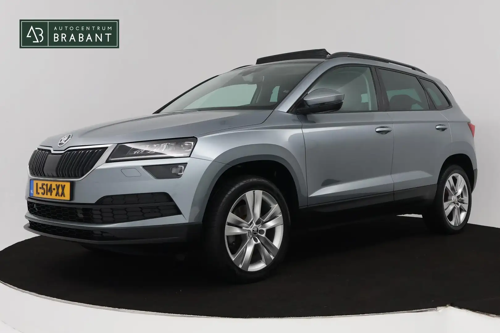Skoda Karoq 1.5 TSI ACT Style Business (PANORAMADAK, CRUISE AD Grijs - 1