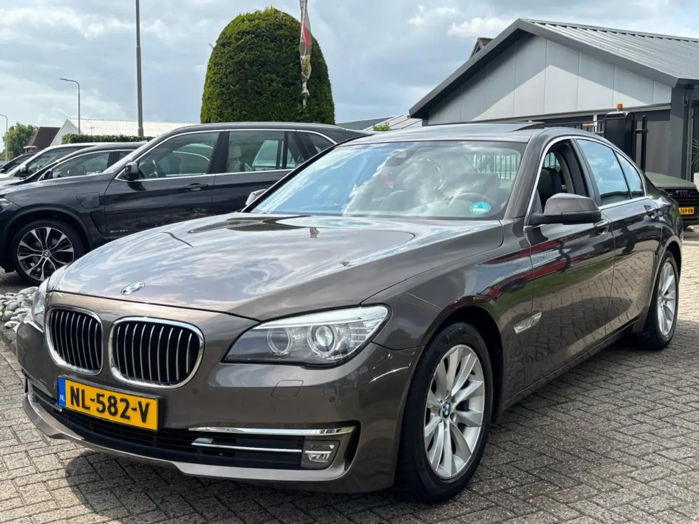 BMW 730 7-serie 730D High Executive Facelift 2012 Schuifda Bruin - 1