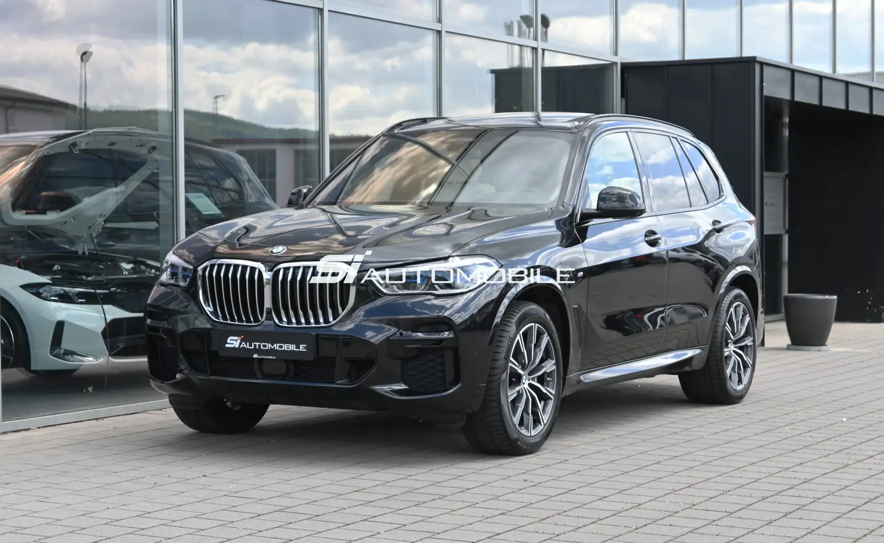 BMW X5 xDr.40i M SPORT *ACC*AHK*HUD*MERINO*PANO*360°K. Schwarz - 1
