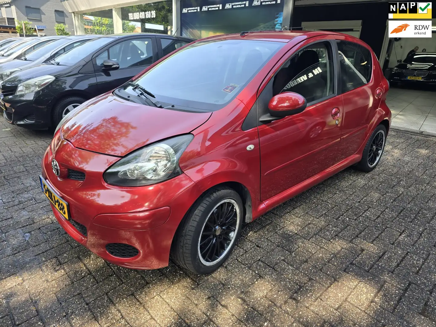 Toyota Aygo 1.0-12V Aspiration Green | 12MND GARANTIE | AIRCO Rosso - 1