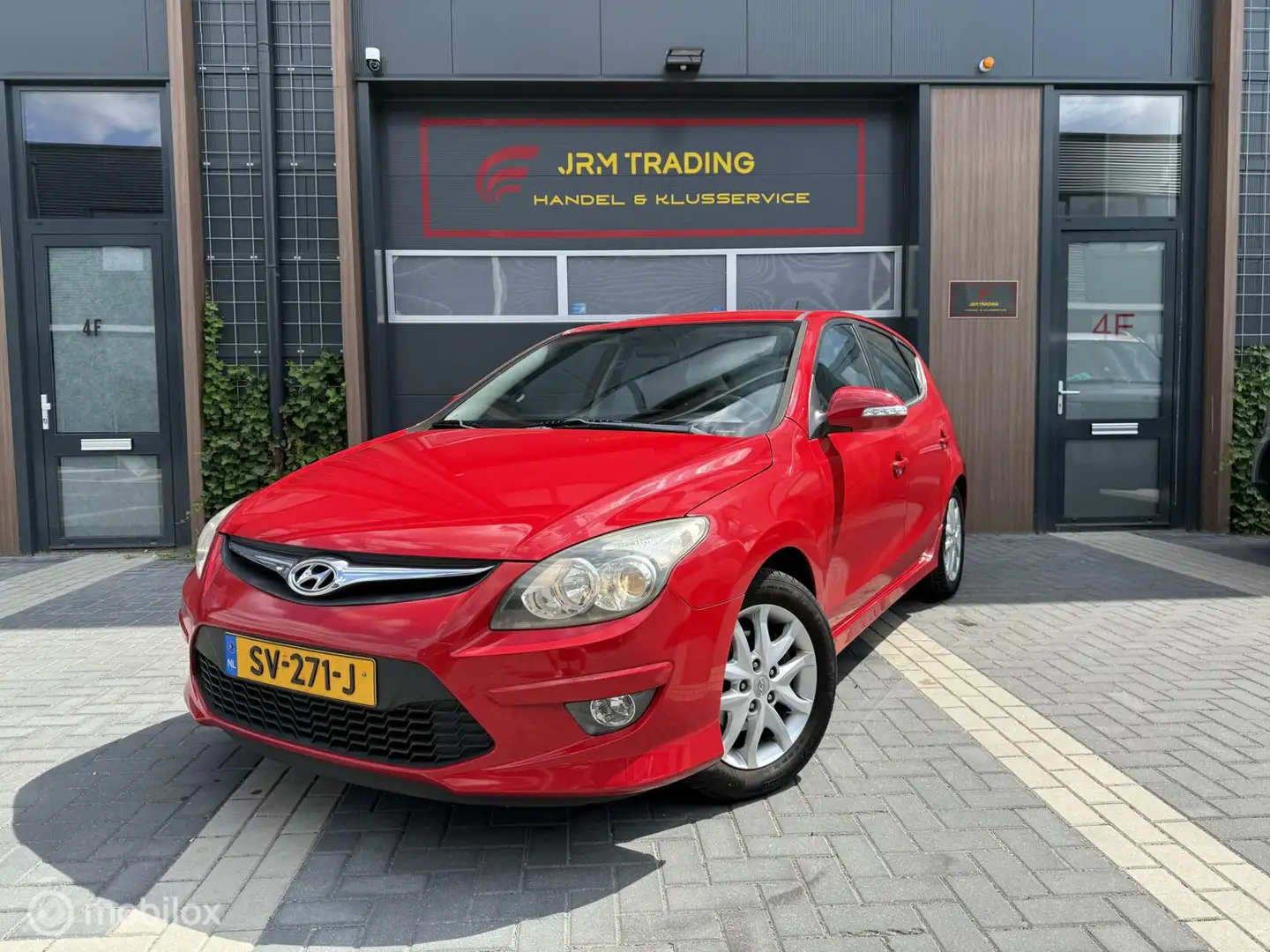 Hyundai i30 1.6i i-Drive stoelverwarming airco cruisecontrol Rood - 1