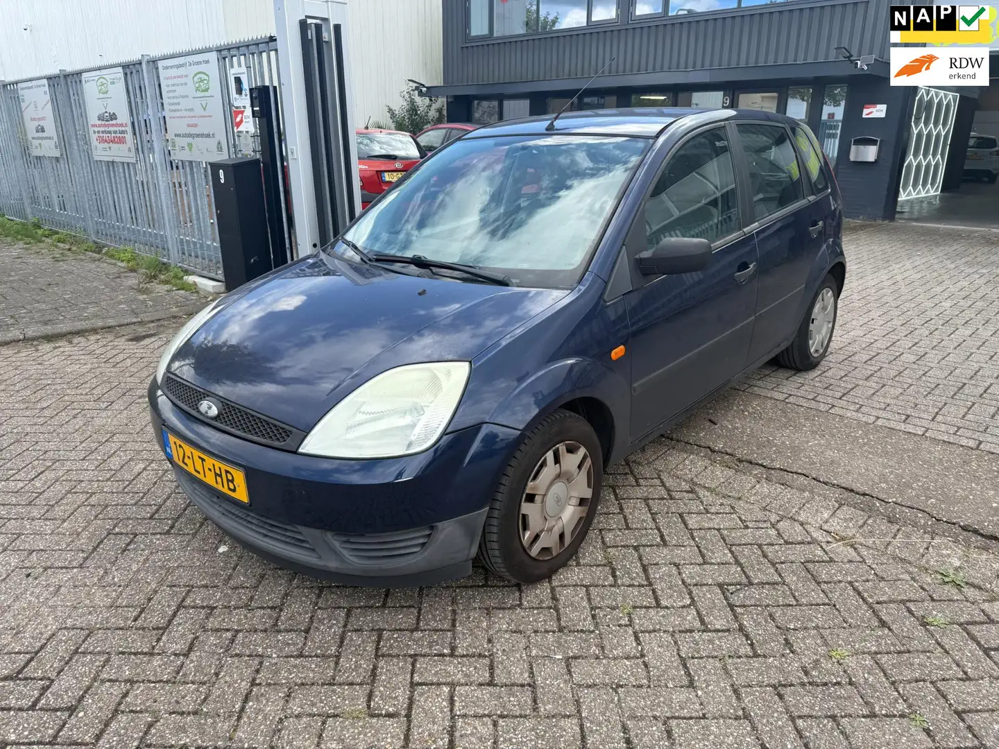 Ford Fiesta 1.4-16V Ambiente Bleu - 1