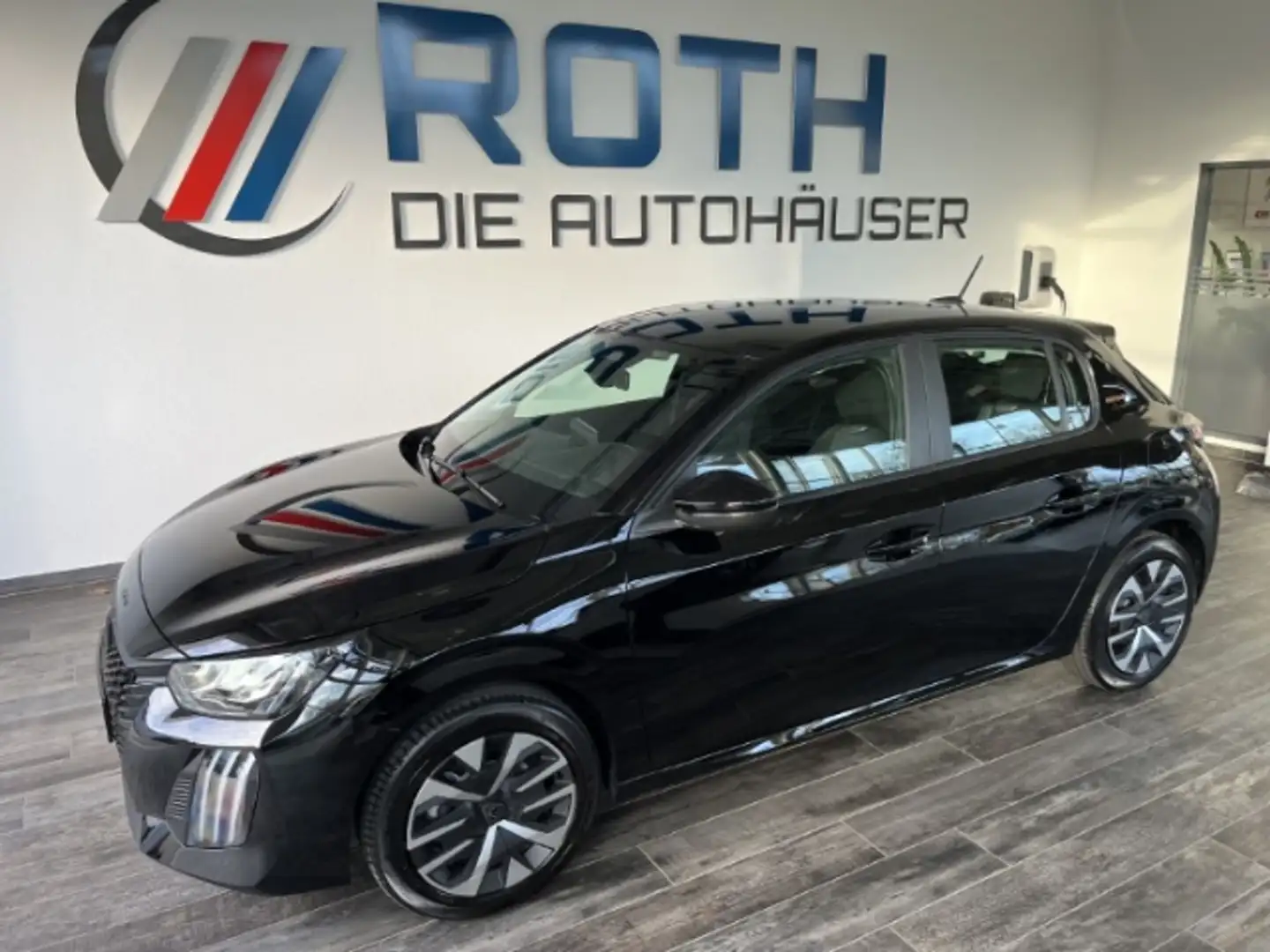 Peugeot 208 e-136 Style Navi Klimaautom DAB SHZ Spurhalteass. Schwarz - 1