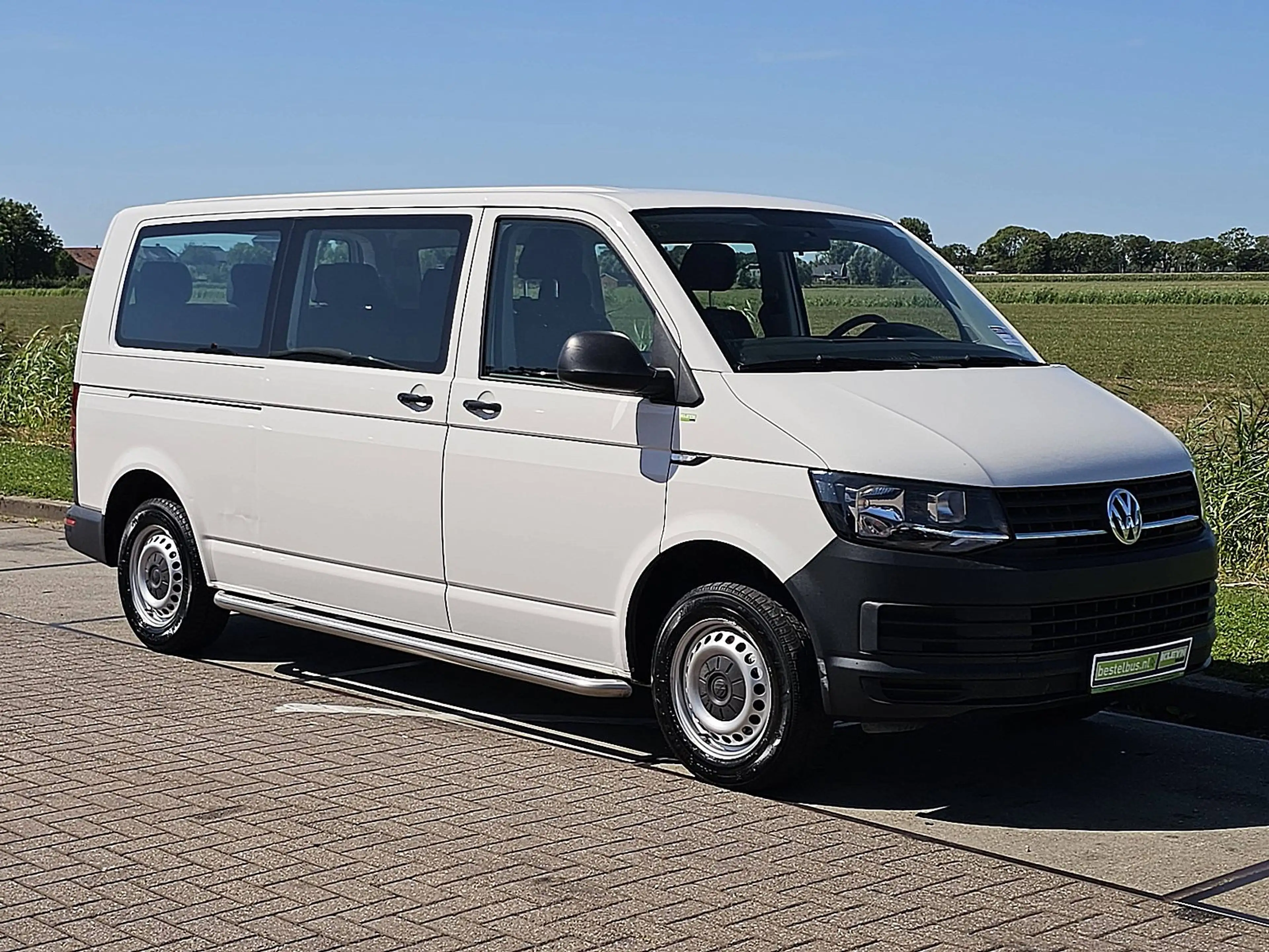 Volkswagen Transporter 2.0 TDI L2H1 Combi 9-pers AC — photo 5
