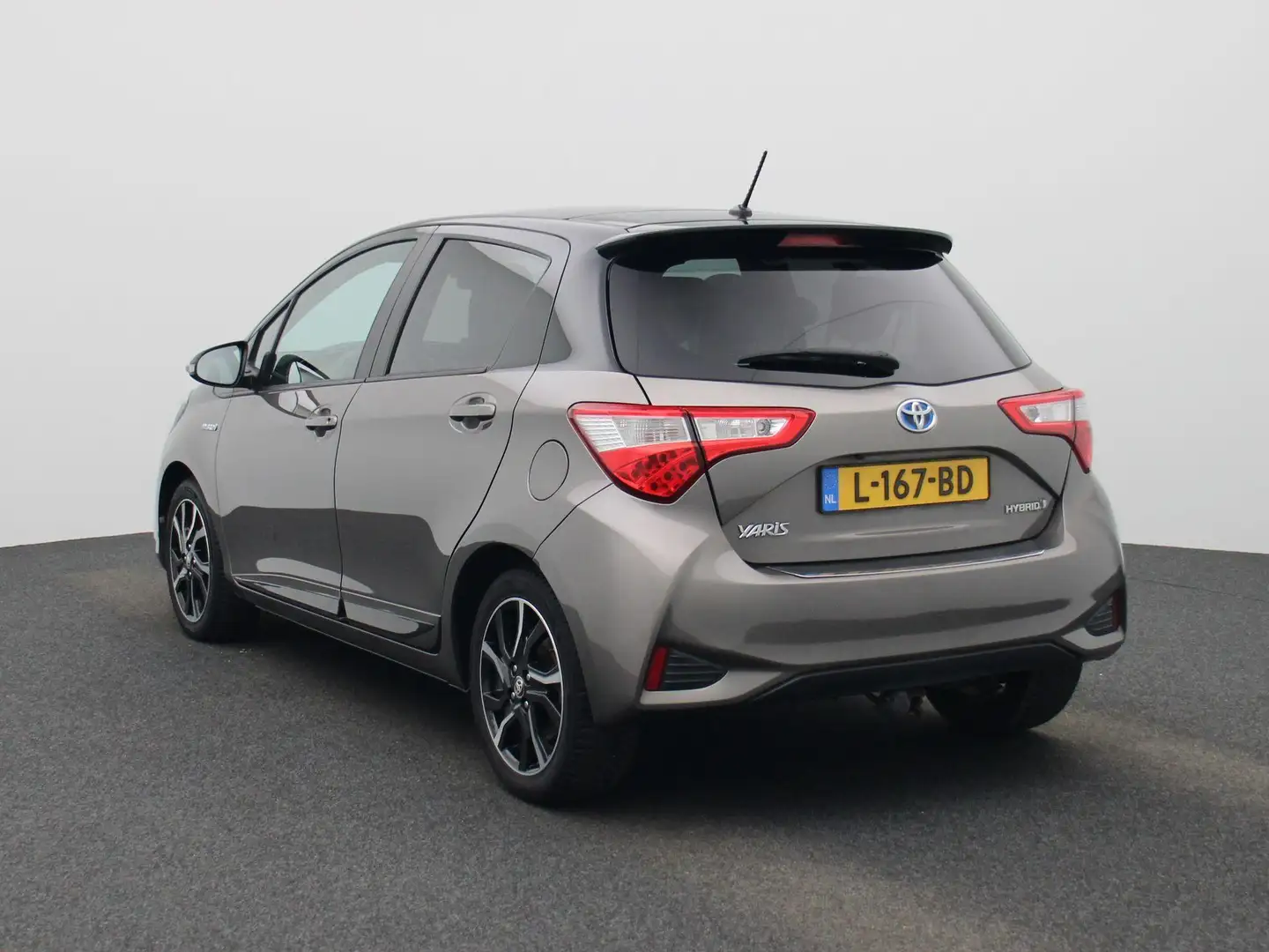 Toyota Yaris 1.5 Hybrid Bi-Tone | Automaat | Panoramadak | Cam Gris - 2