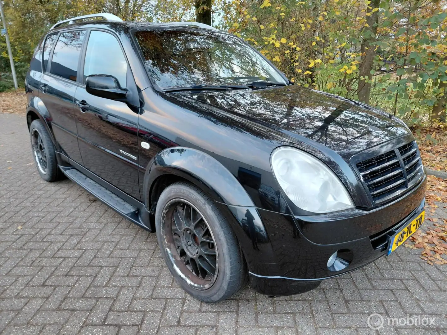 SsangYong Rexton RX 270 Xdi 4X4 airco leer storing automaat Schwarz - 1