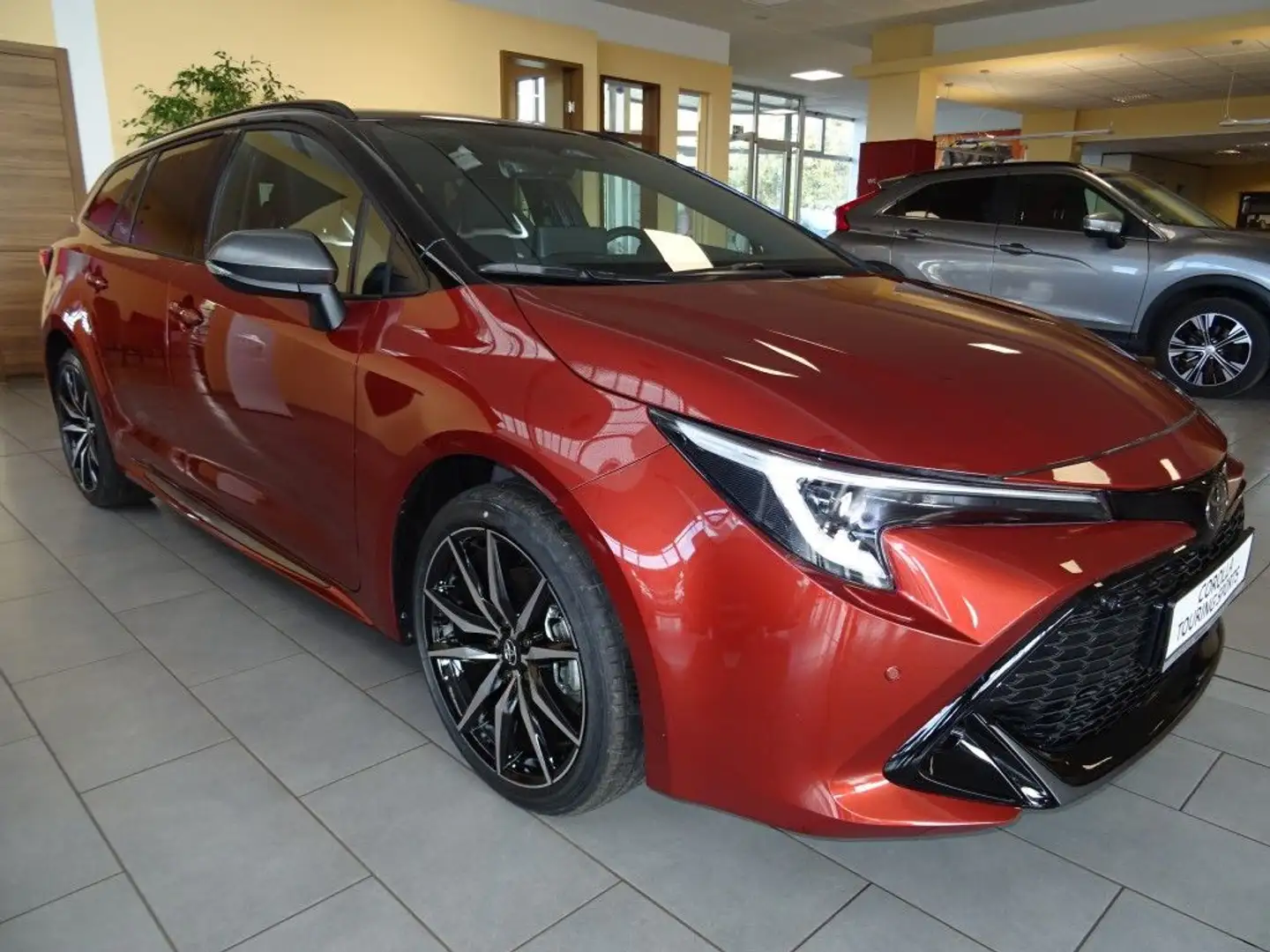 Toyota Corolla 2.0 Hybrid Touring Sports GR Sport Orange - 1