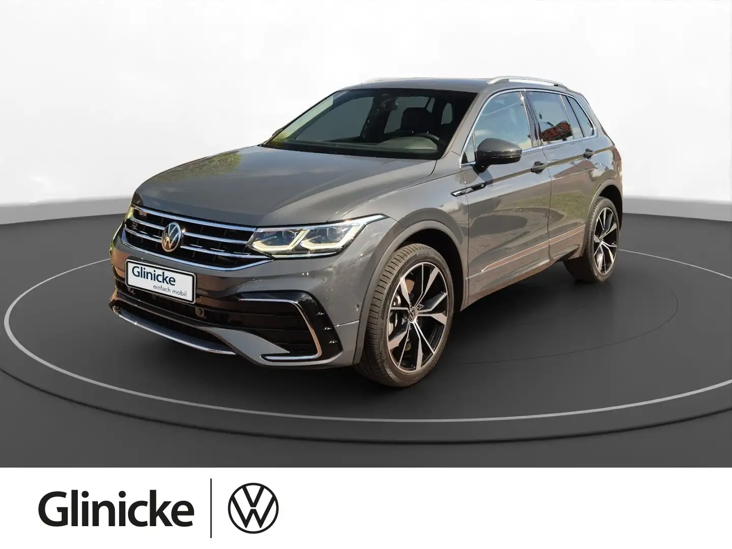 Volkswagen Tiguan 2.0 TDI DSG R-Line 4Motion Navi AHK Kamer Grau - 1