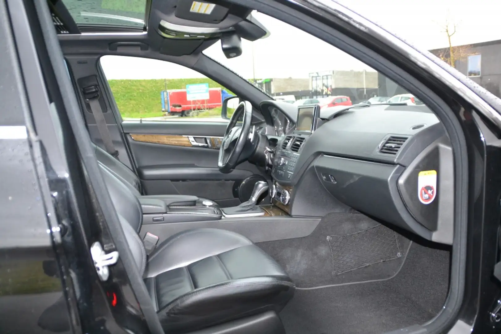 Mercedes-Benz C 63 AMG Mercedes AMG 6.2 V8 | Carbon | 2009 | 144.835 km | Zwart - 2