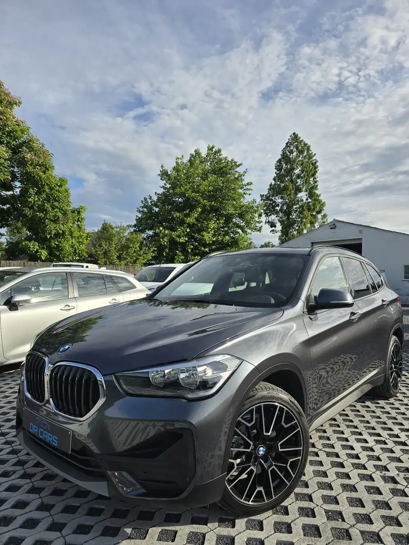 BMW X1 *s-Drive18i Sport Line-Panodak-Navigatie-Leder* - 1