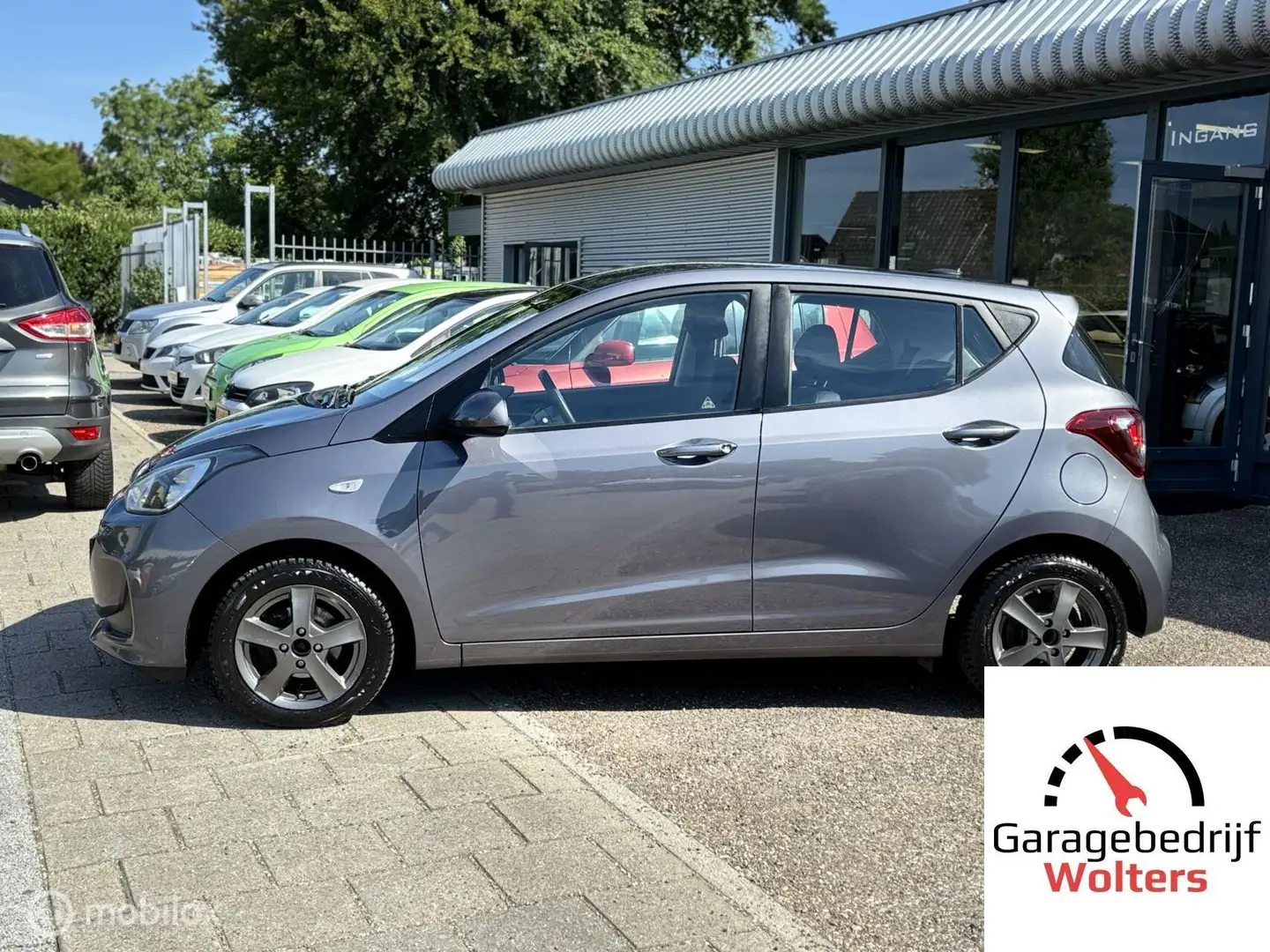 Hyundai i10 1.0i i-Premium AIRCO NAVI CRUISE LMV NW APK Grijs - 2