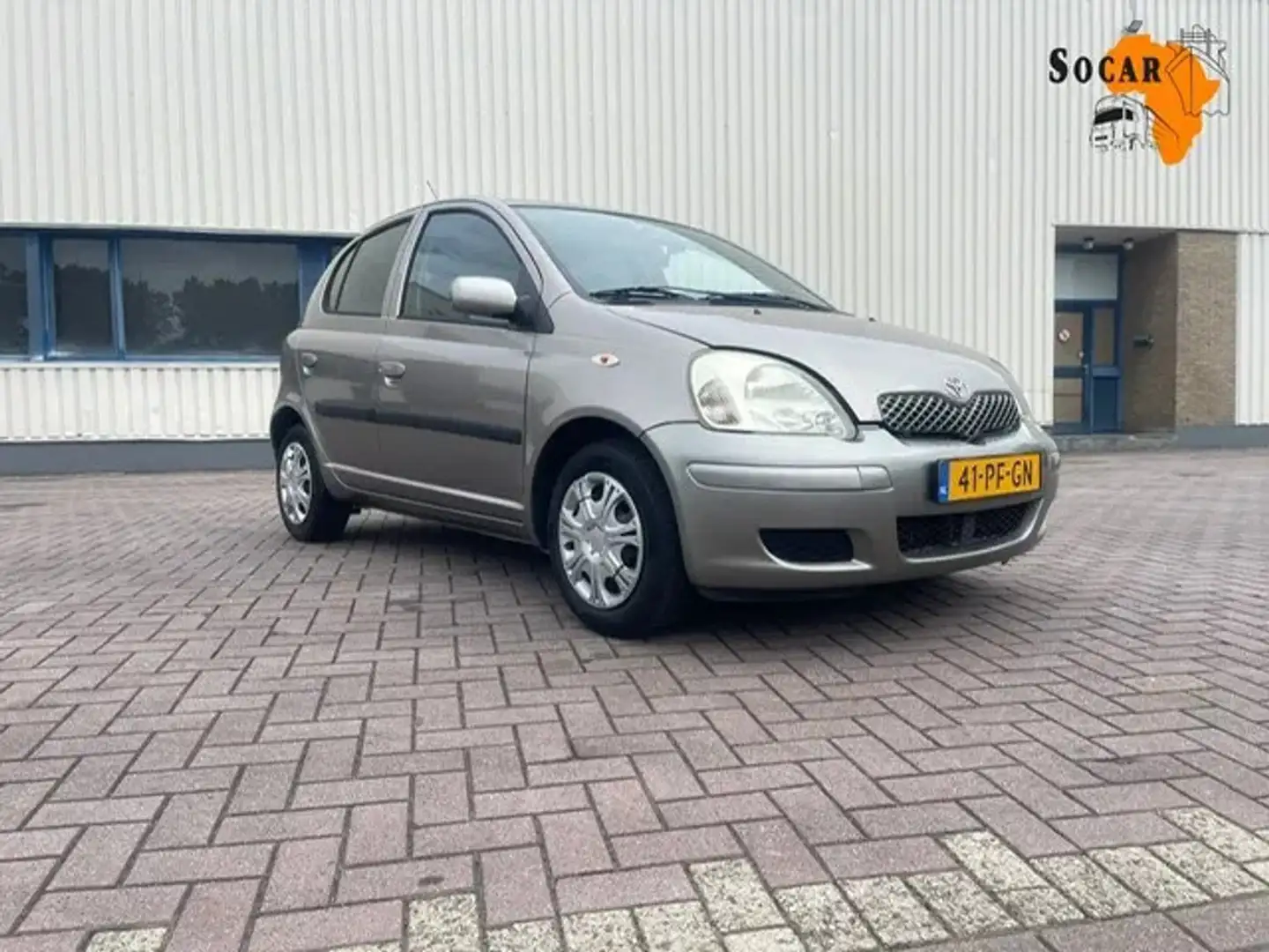Toyota Yaris 1.0 VVT-I Automaat 5drs Airco Grijs - 1