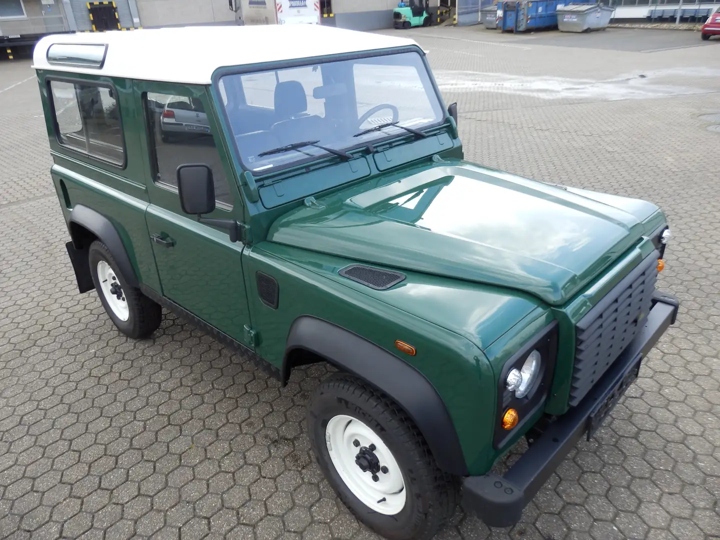 Land Rover Defender 90 Td5, 1. Hand, Servo, Klima, AHK, LED, 7 Sitzer Verde - 1