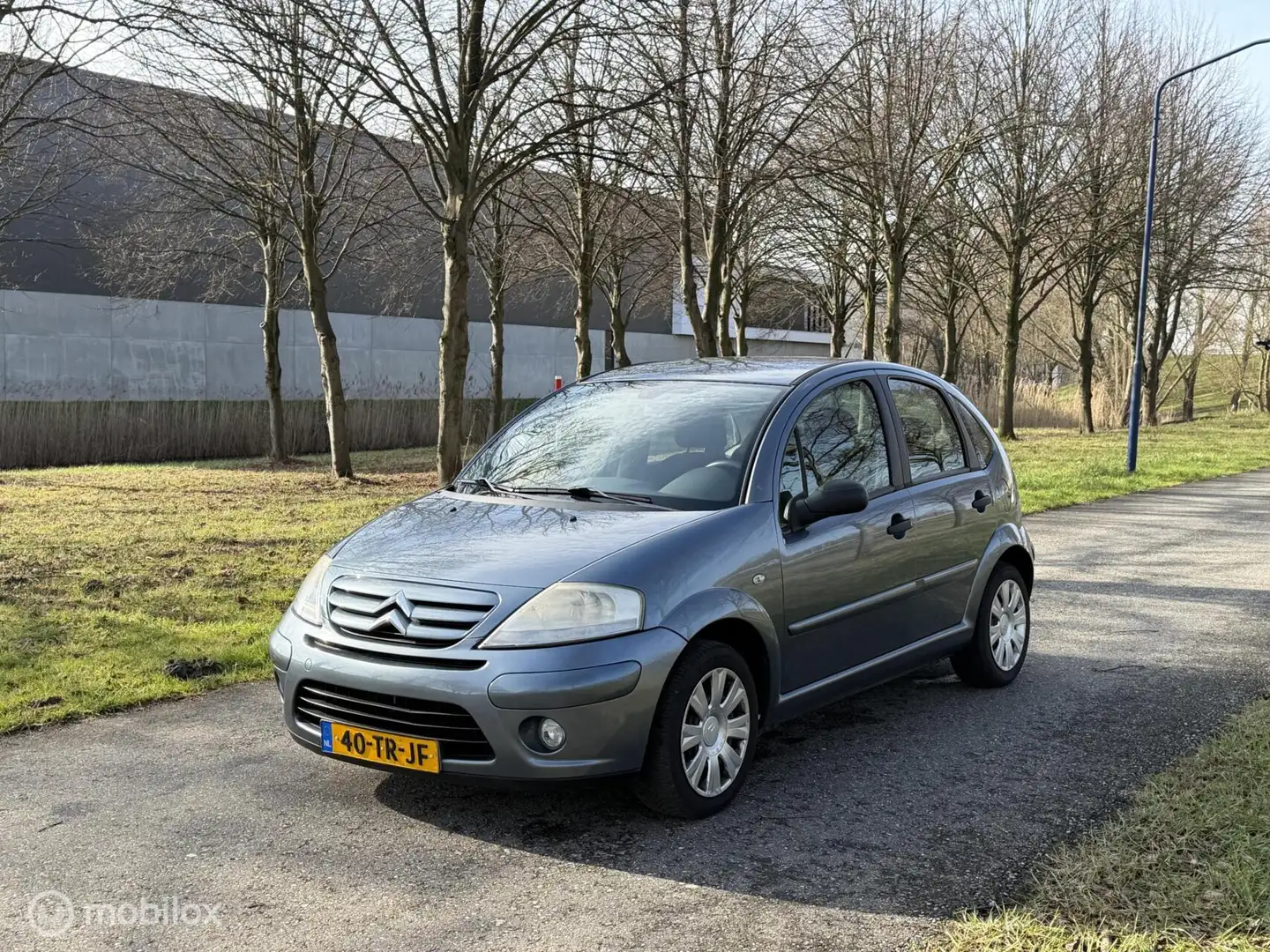 Citroen C3 1.4i-16V Ambiance*NEW APK*PARKEERSENSOR*CRUISE Grau - 1