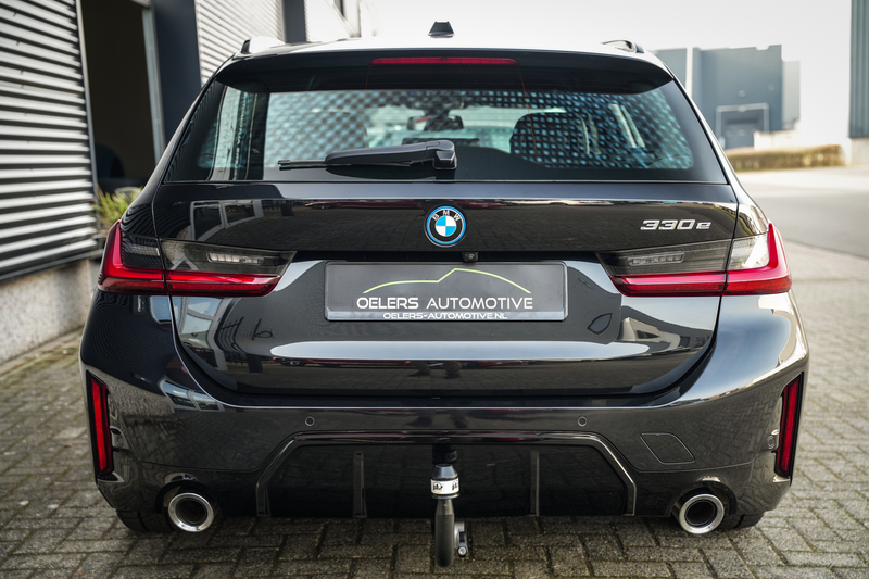 BMW 330 3-serie Touring 330e M-Sport Facelift | SOH 97% | — photo 37