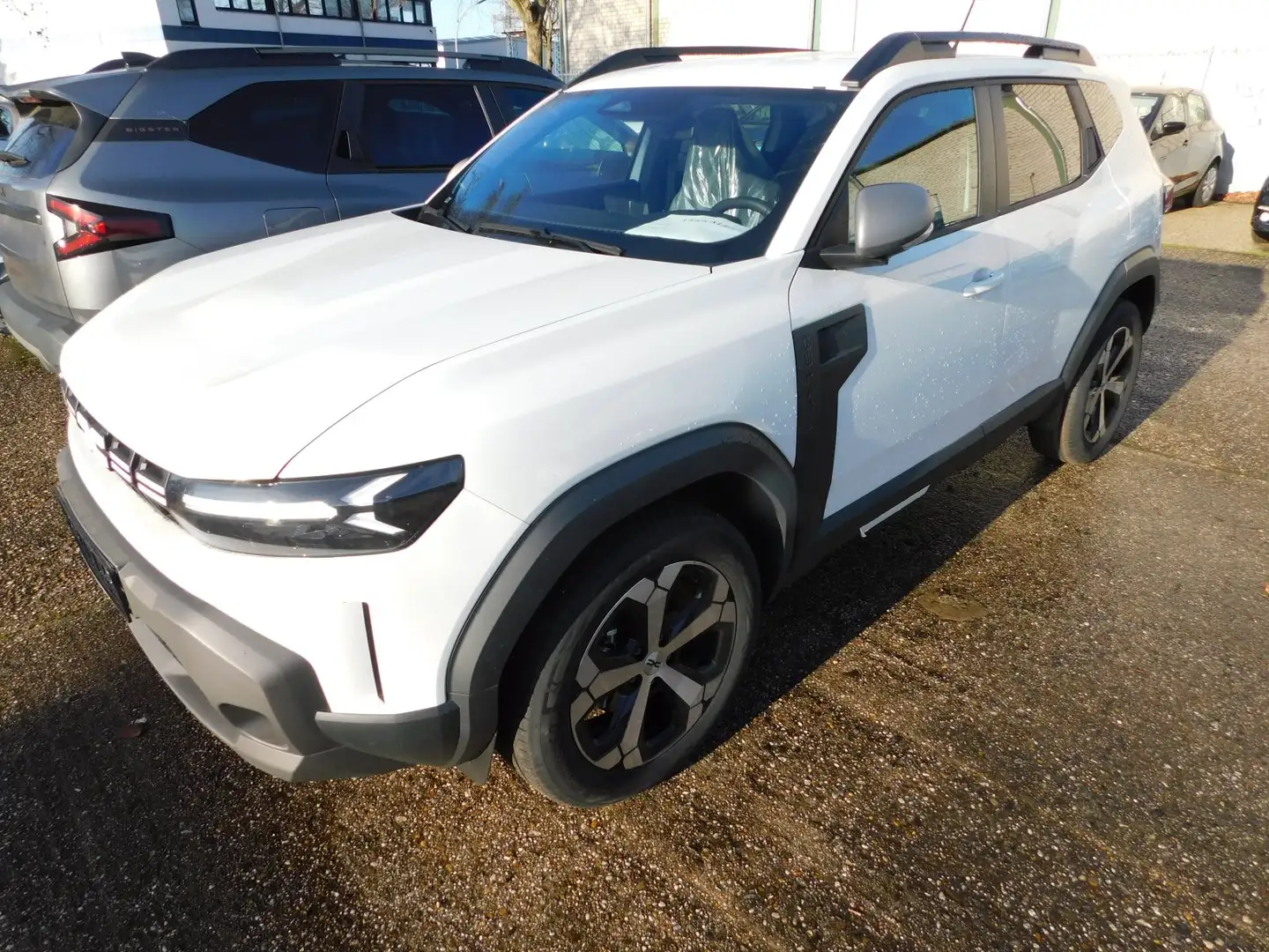 Dacia Duster III 1.6 E-TECH Hybr. 140 Journey (EU 6e) Bianco - 1