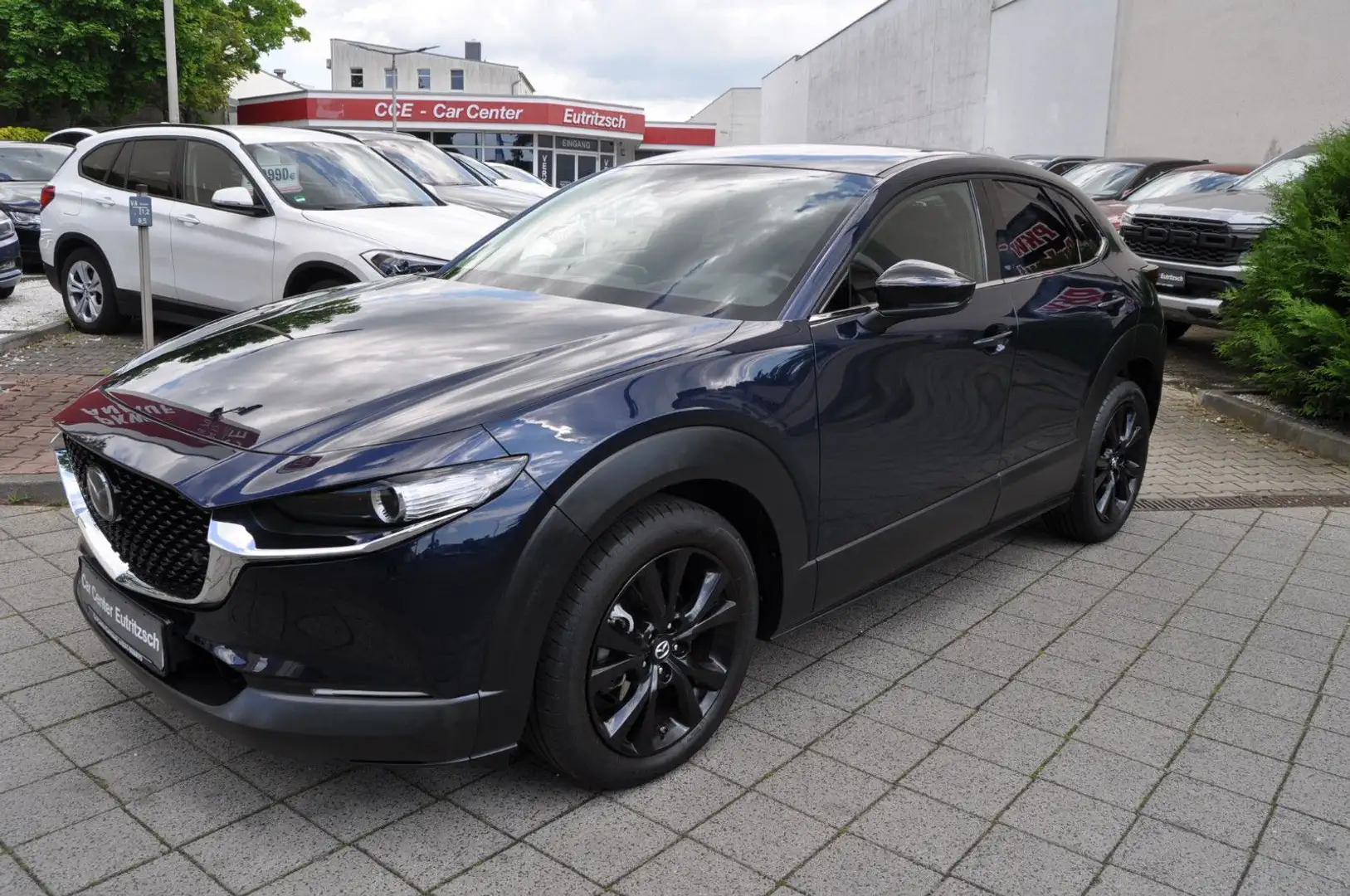 Mazda CX-3 0 e-SKYACTIV-G 2.0 M HYBRID Homura LED HUD Blau - 1