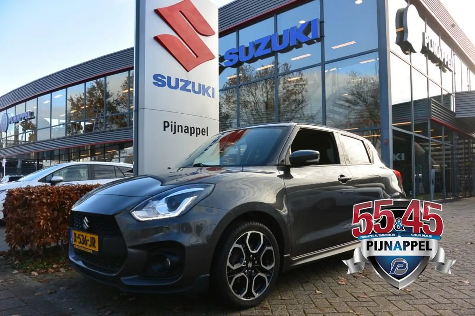 Suzuki Swift 1.4 Sport Turbo Boosterjet 5-deurs Navigatie / All Grijs - 1