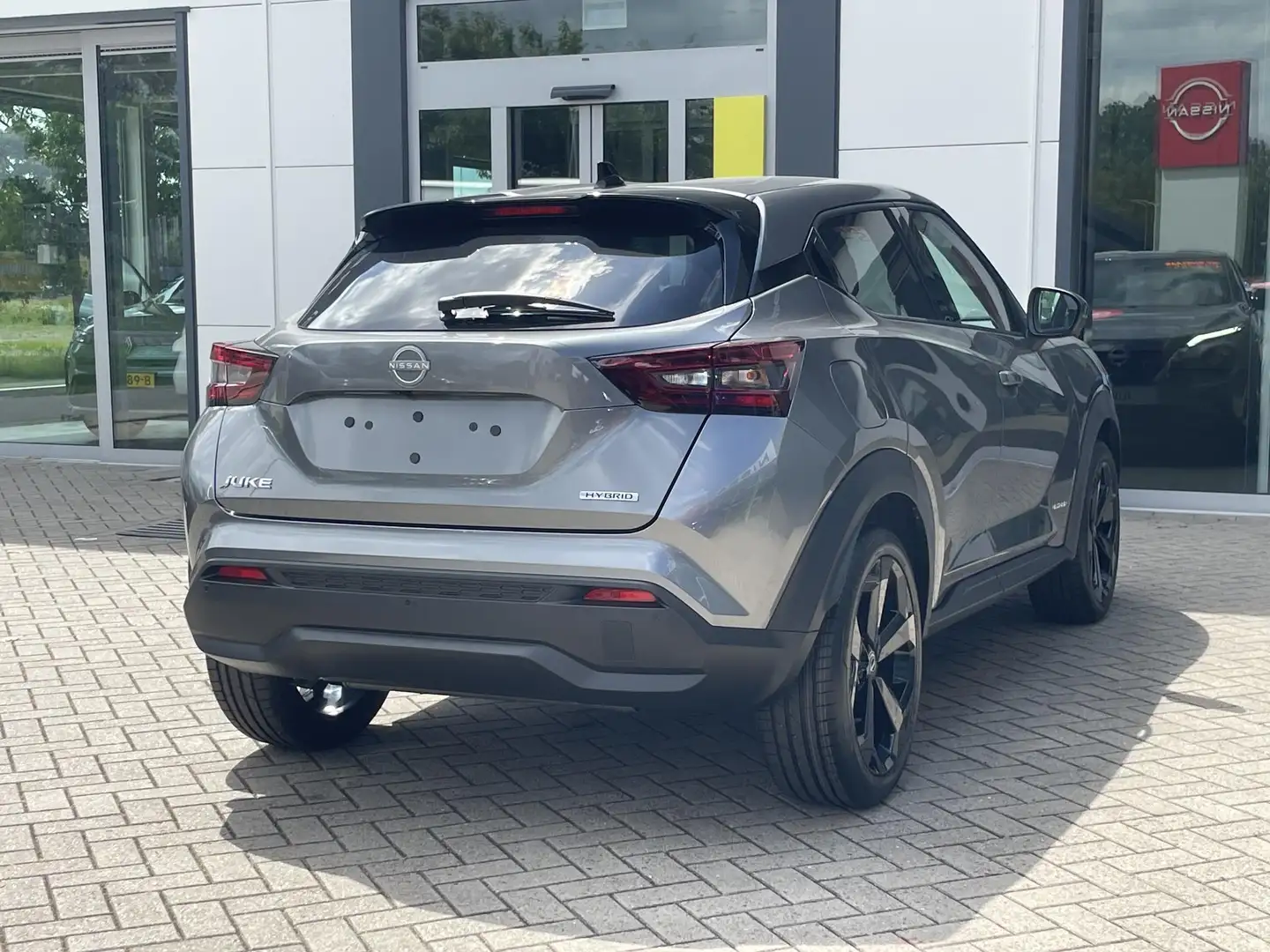Nissan Juke 1.6 Hybrid Tekna | Bose sound pack | 19" lichtmeta - 2