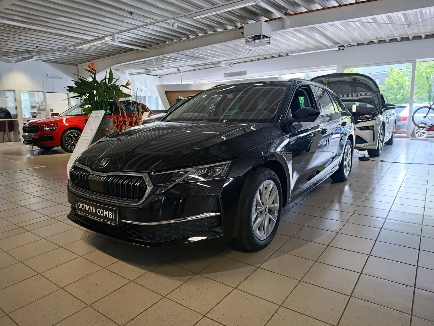 Skoda Octavia 1.5 TSI 85 kW Essence Noir - 1