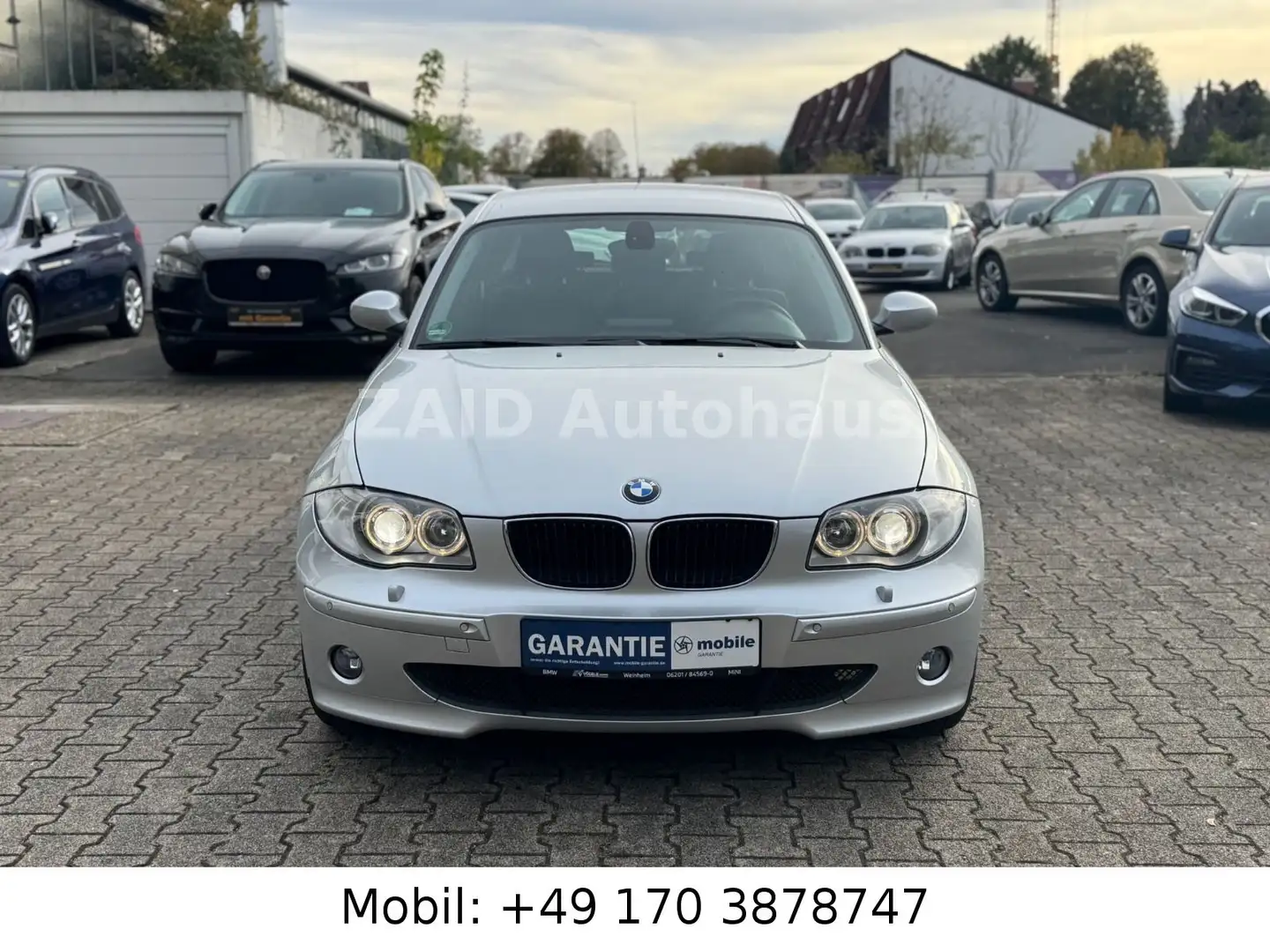BMW 120 i Baureihe 1 Lim.*1HAND*NAVI*PDC*BI-XE*66tkm* Silber - 2