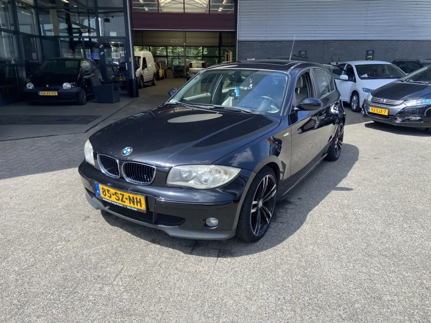 BMW 118 1-serie 118d High Executive Zwart - 1