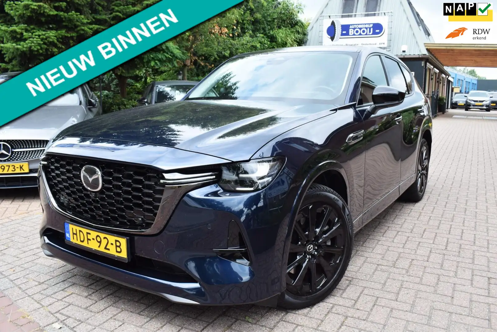 Mazda CX-60 2.5 e-SkyActiv PHEV Takumi AUTOM/PDC V+A/CARPLAY/C Blauw - 1