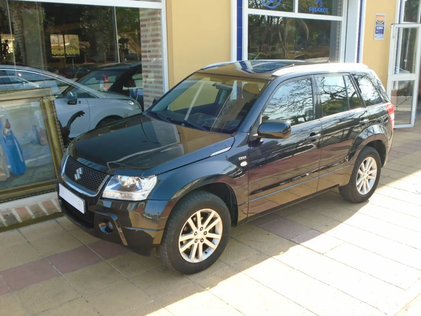 Suzuki Grand Vitara 1.9DDiS JLX-ES Zwart - 1