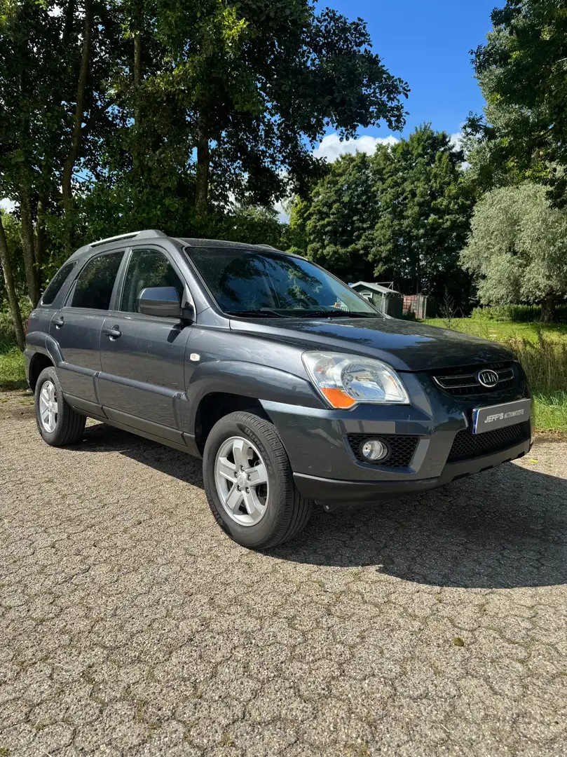 Kia Sportage 2.0 CVVT Comfort Gris - 1