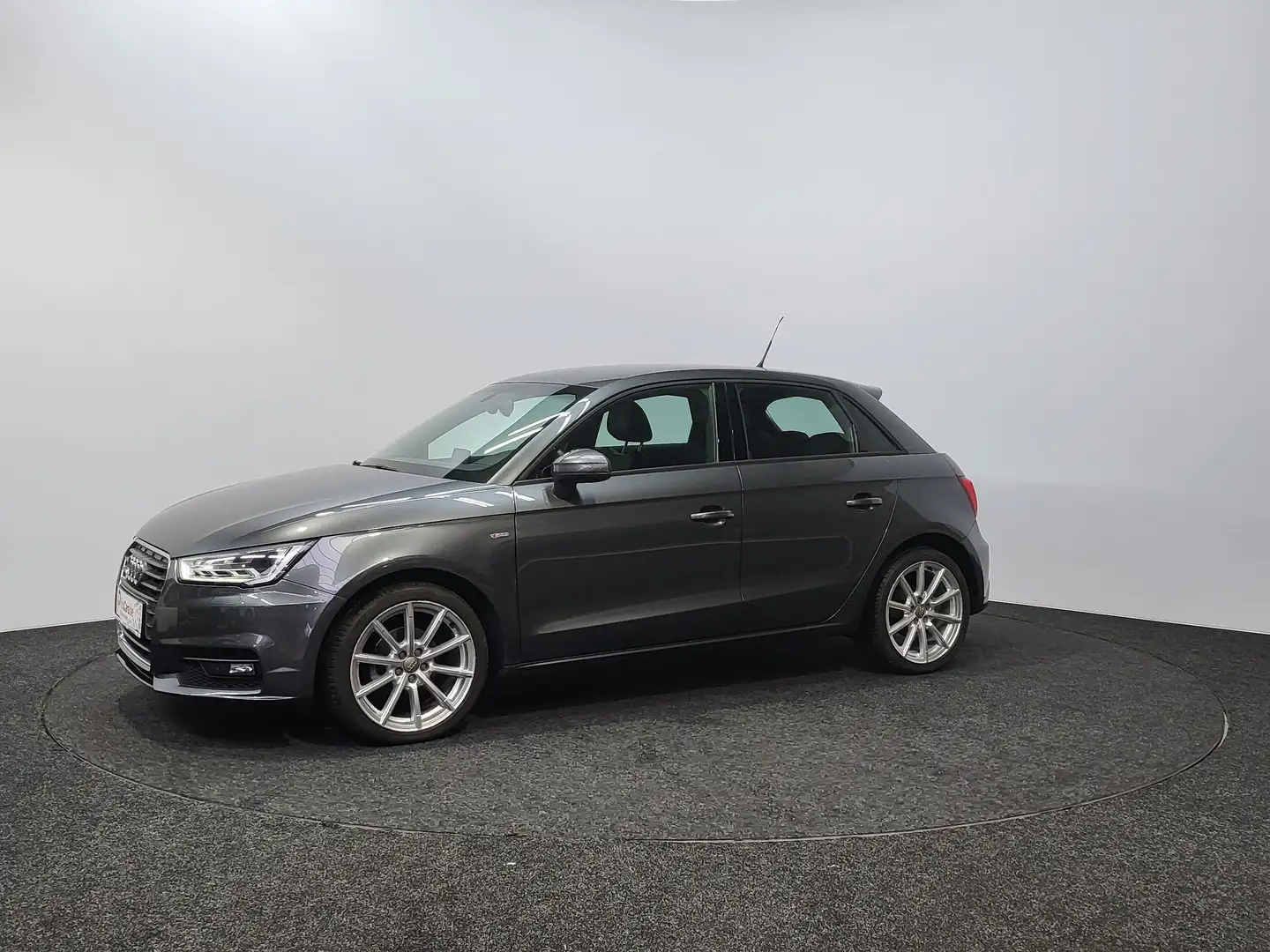 Audi A1 1.0 TFSI S-Line ~ Automaat ~ Xenon ~ Navi ~ Airco Grau - 1
