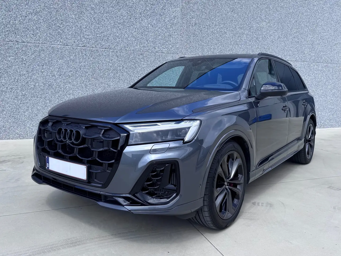 Audi Q7 60 TFSI e S line quattro 490pk - 3 jaar GARANTIE Gris - 1