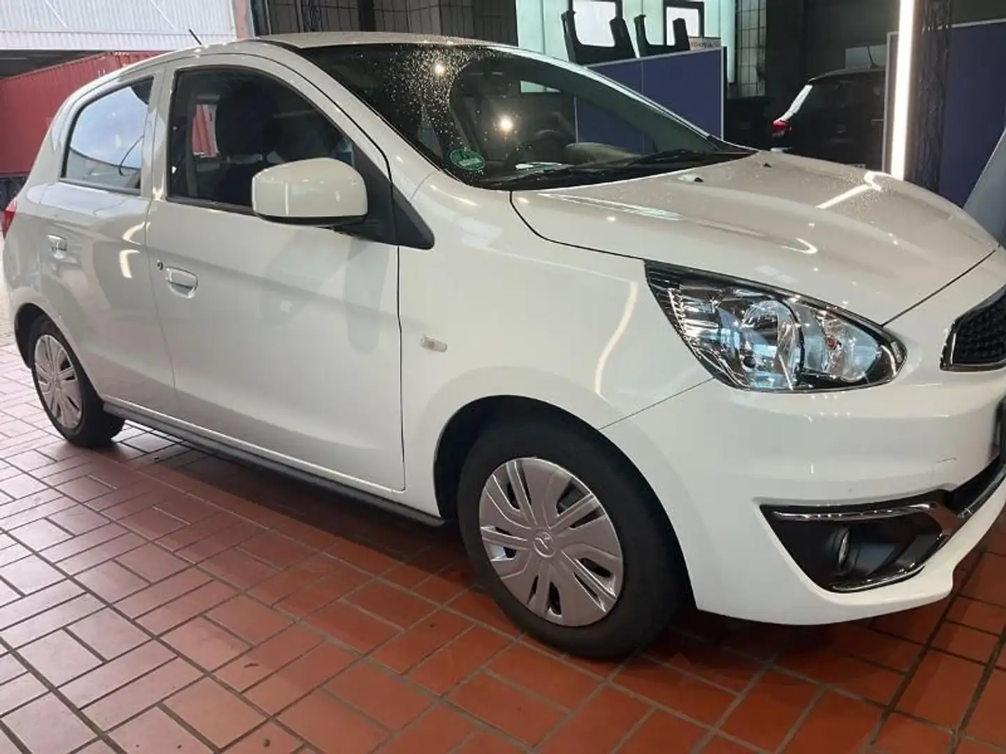 Mitsubishi Space Star 1.0 *8-Räder*1.Hand*Bluetooth* Weiß - 1