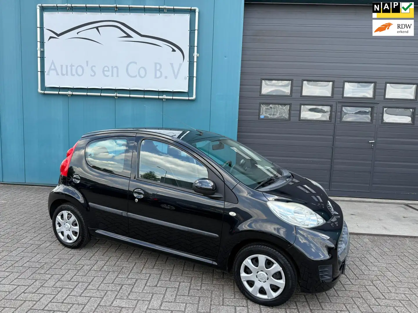 Peugeot 107 1.0-12V Sublime 5-deurs 66350 Km Airco NL Auto NAP Zwart - 1