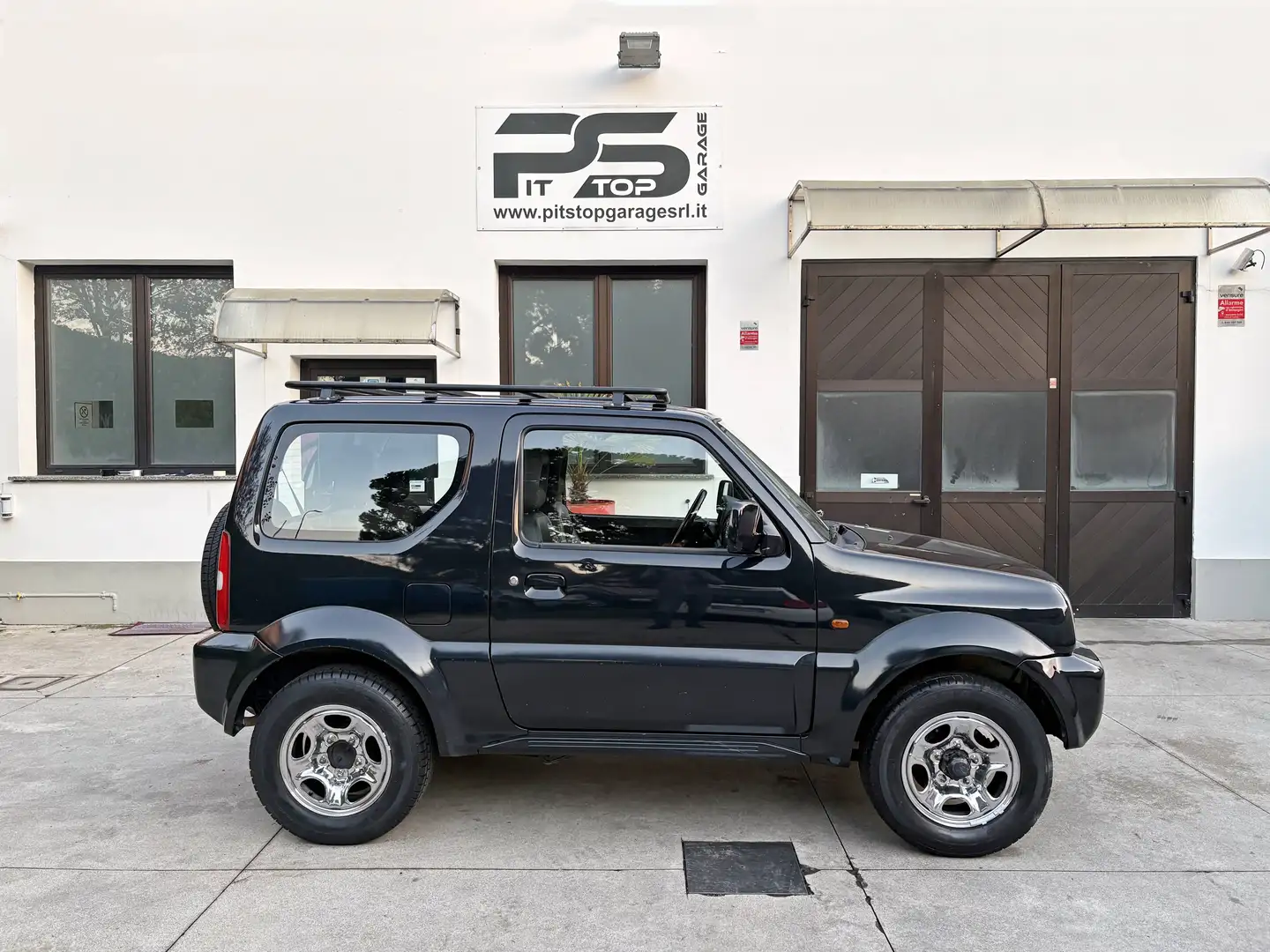 Suzuki Jimny Jimny 1.3 16v 4wd - A\C - Gancio - Storico Schwarz - 1
