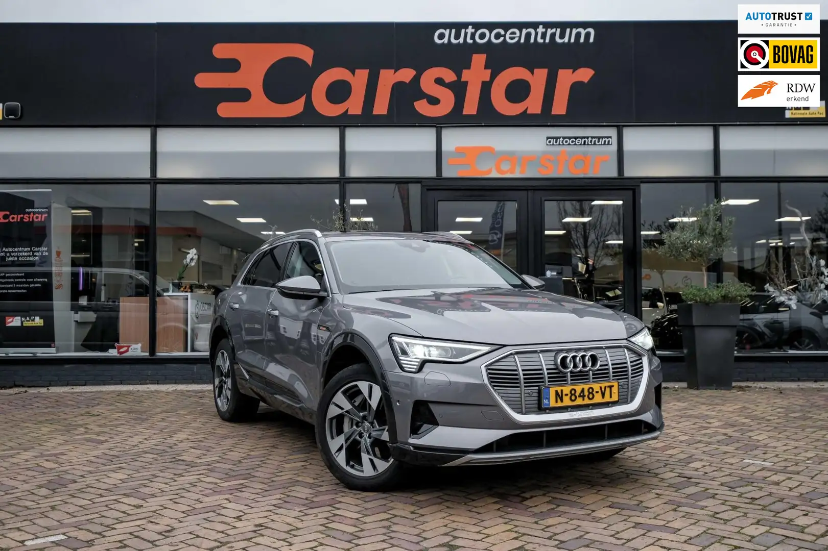 Audi e-tron E-tron|Dak|Leer| 55 quattro Pro Line Plus 95 kWh Grijs - 1