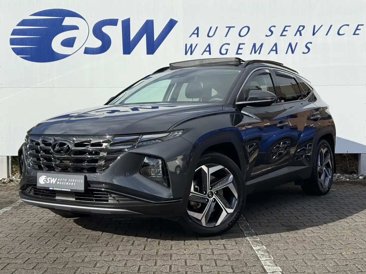Hyundai TUCSON 1.6 T-GDI PHEV Comfort Smart 4WD | Trekhaak | Pano Gris - 1