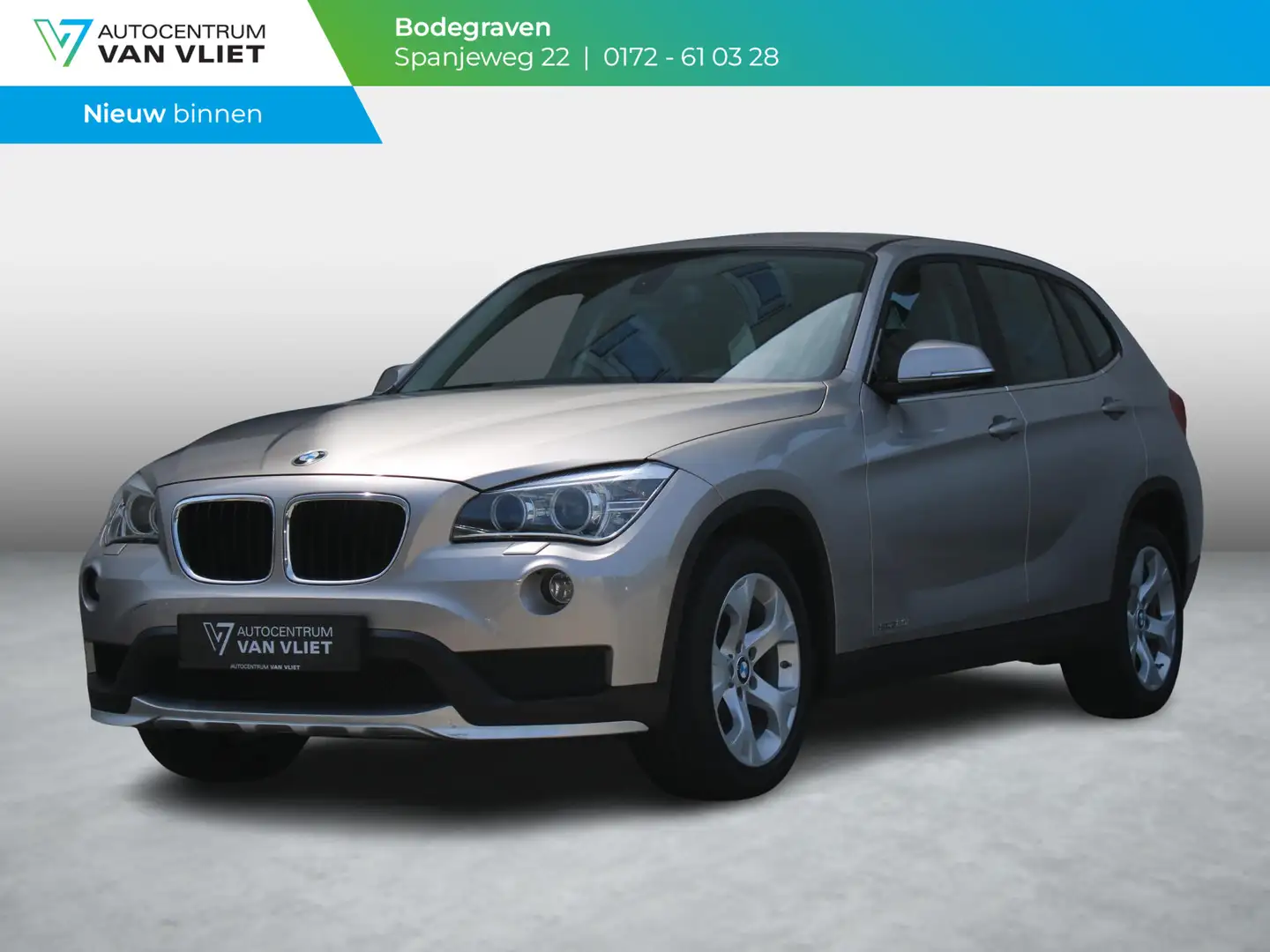 BMW X1 sDrive20i Executive | TREKHAAK | NAVIGATIE | 12 MA Grijs - 1