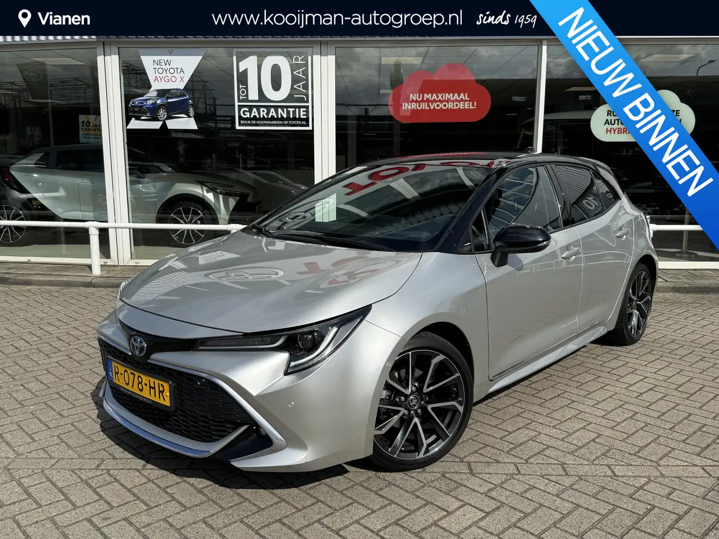 Toyota Corolla 1.8 Hybrid Executive Grijs - 1