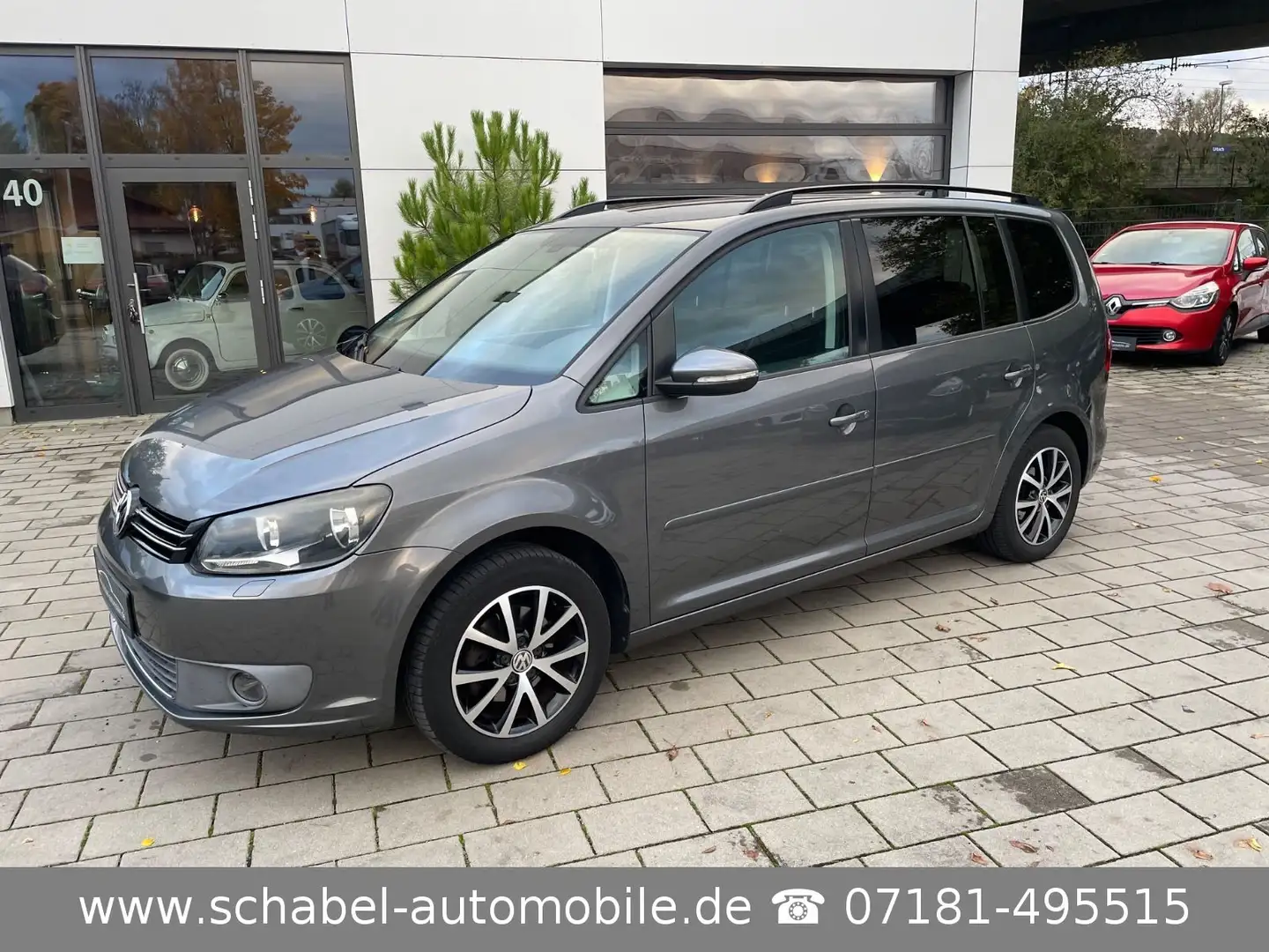 Volkswagen Touran Comfortl. BMT 1.2TSI 1.Hd 90tkm Navi 7Sit Grijs - 1
