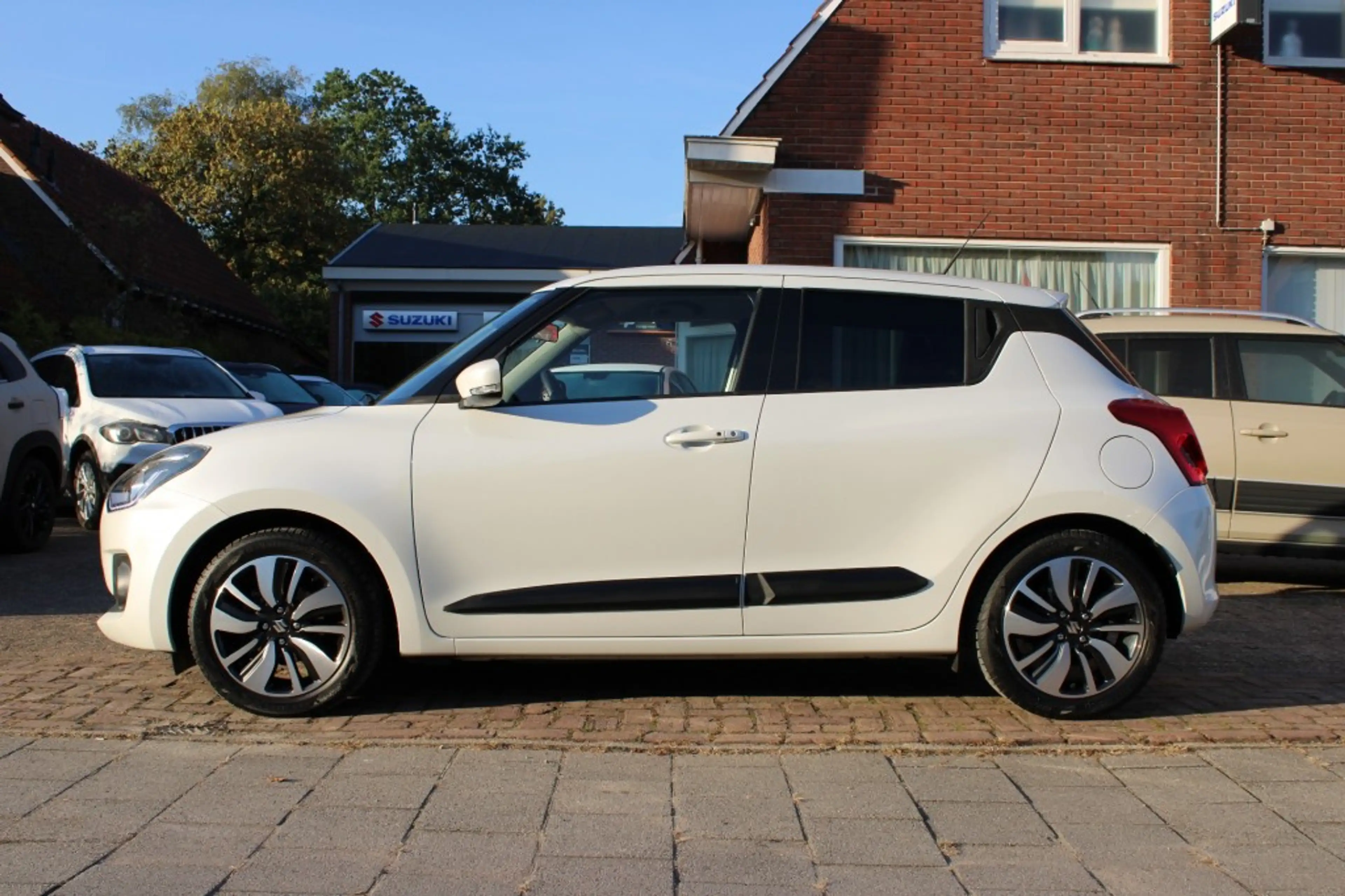 Suzuki Swift 1.2 STIJL SMART HYBR / Rijklaarprijs / Fabrieksgar — photo 2