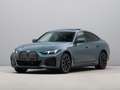 BMW i4 eDrive40 M Sport Pro Groen - thumbnail 1