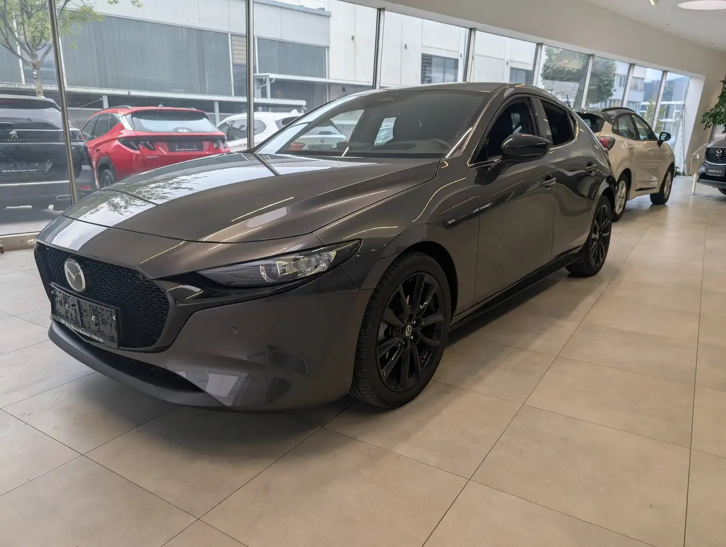 Mazda 3 Mazda 3 e-Skyactiv-G140 Exclusive-Line Aut.*Winterräder Gratis* Schwarz - 1