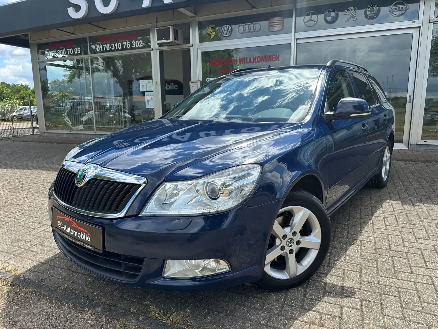 Skoda Octavia Combi Best of*NAVI*PDC*1-HAND*AHK* Blauw - 1