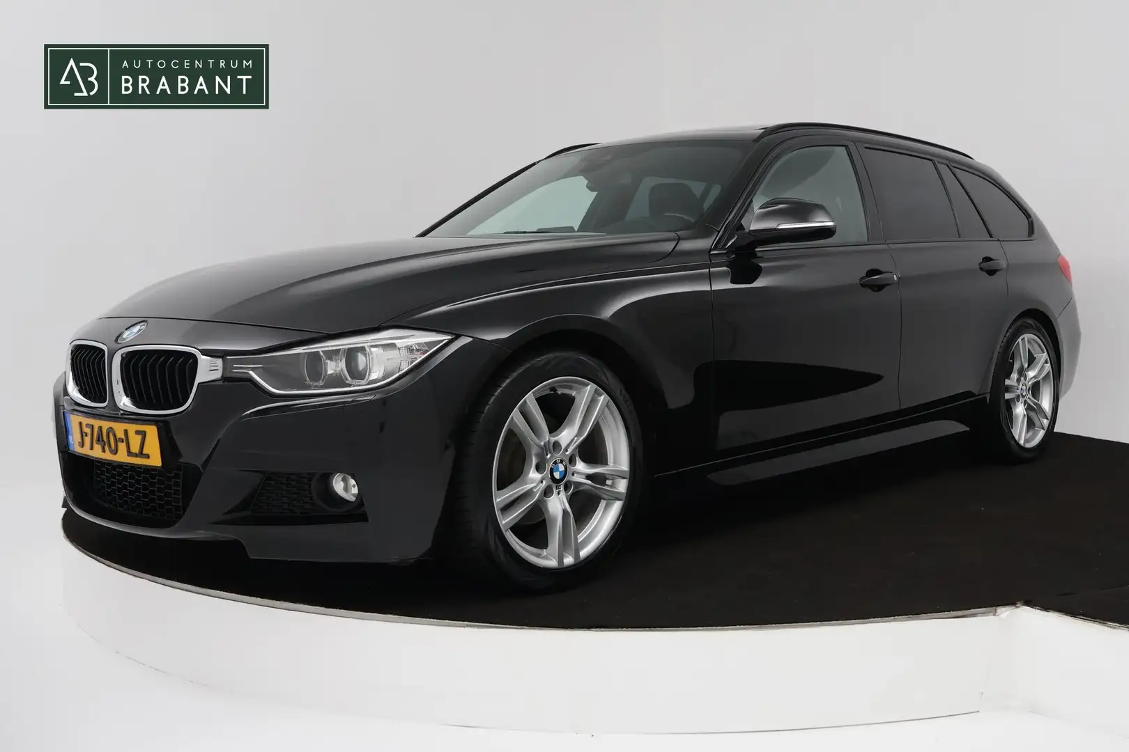 BMW 320 3-serie Touring 320i High Executive (PANORAMADAK, Zwart - 1