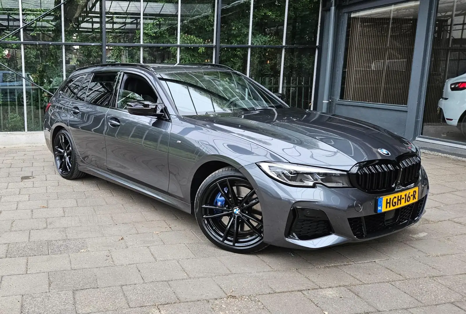 BMW 340 3-serie Touring M340i xDrive High Executive / M-sp Grijs - 1