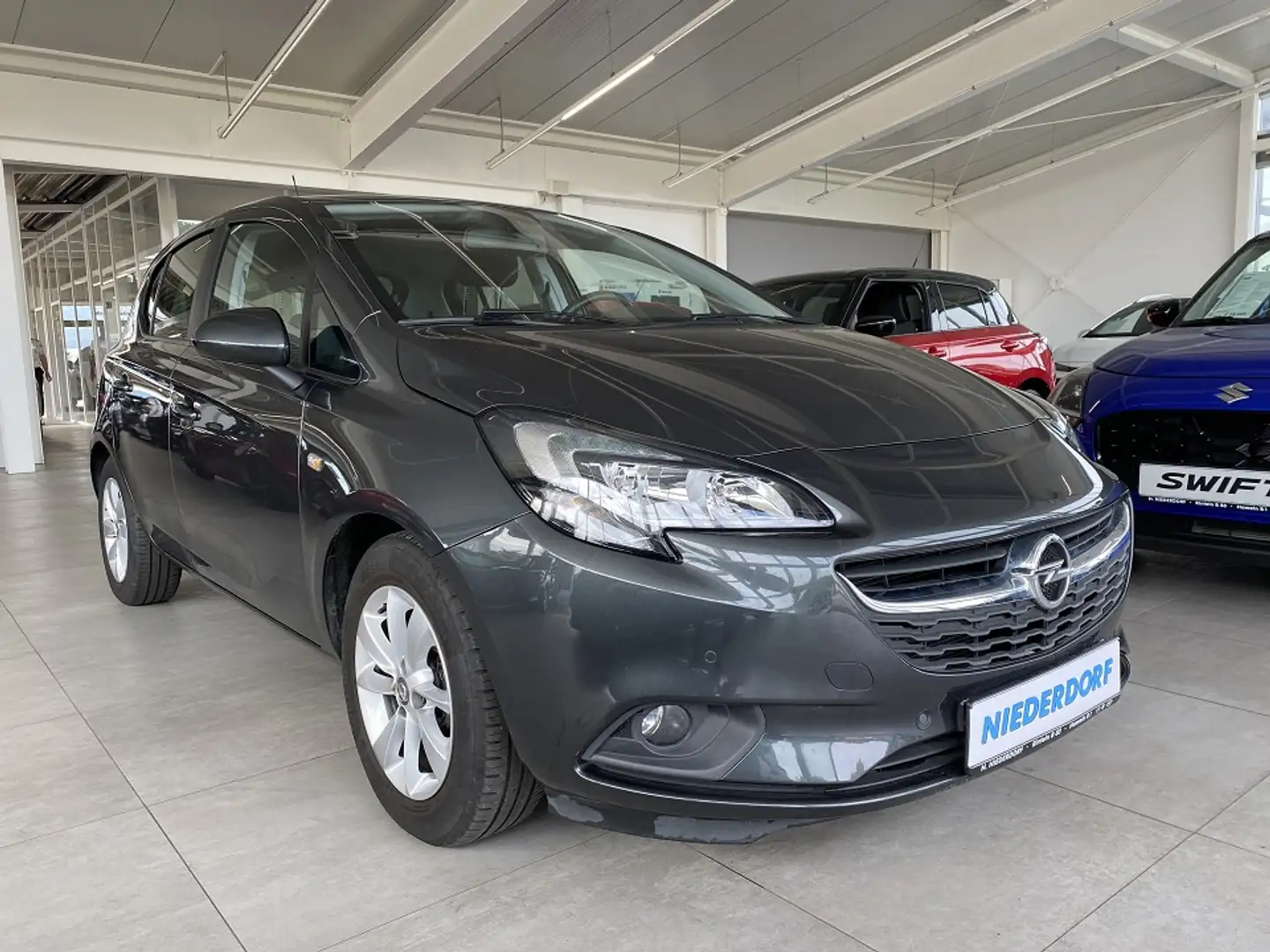 Opel Corsa-e 1.4 ON Tempom. Sitz,lenkr.Hzg PDC KAM Grau - 1