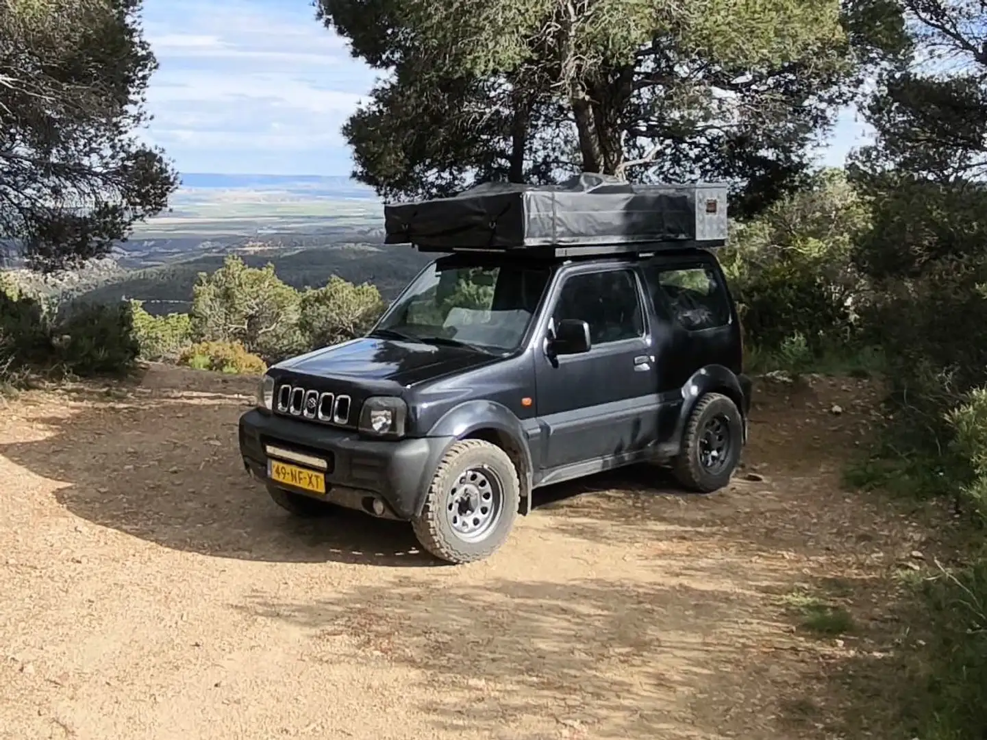 Suzuki Jimny Jimny 1.3 JLX Zwart - 1