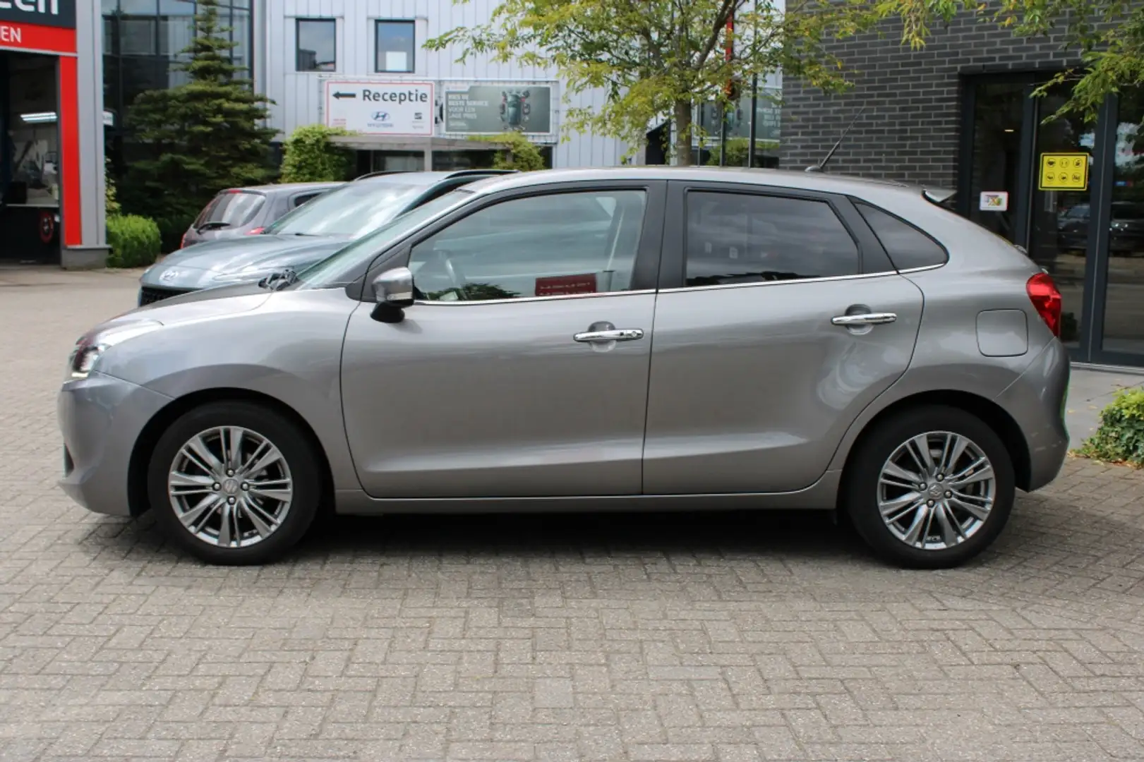 Suzuki Baleno 1.0 B.jet High Exec. Navi/Led/Cruise/Winter/Pdc/Ca Grijs - 2